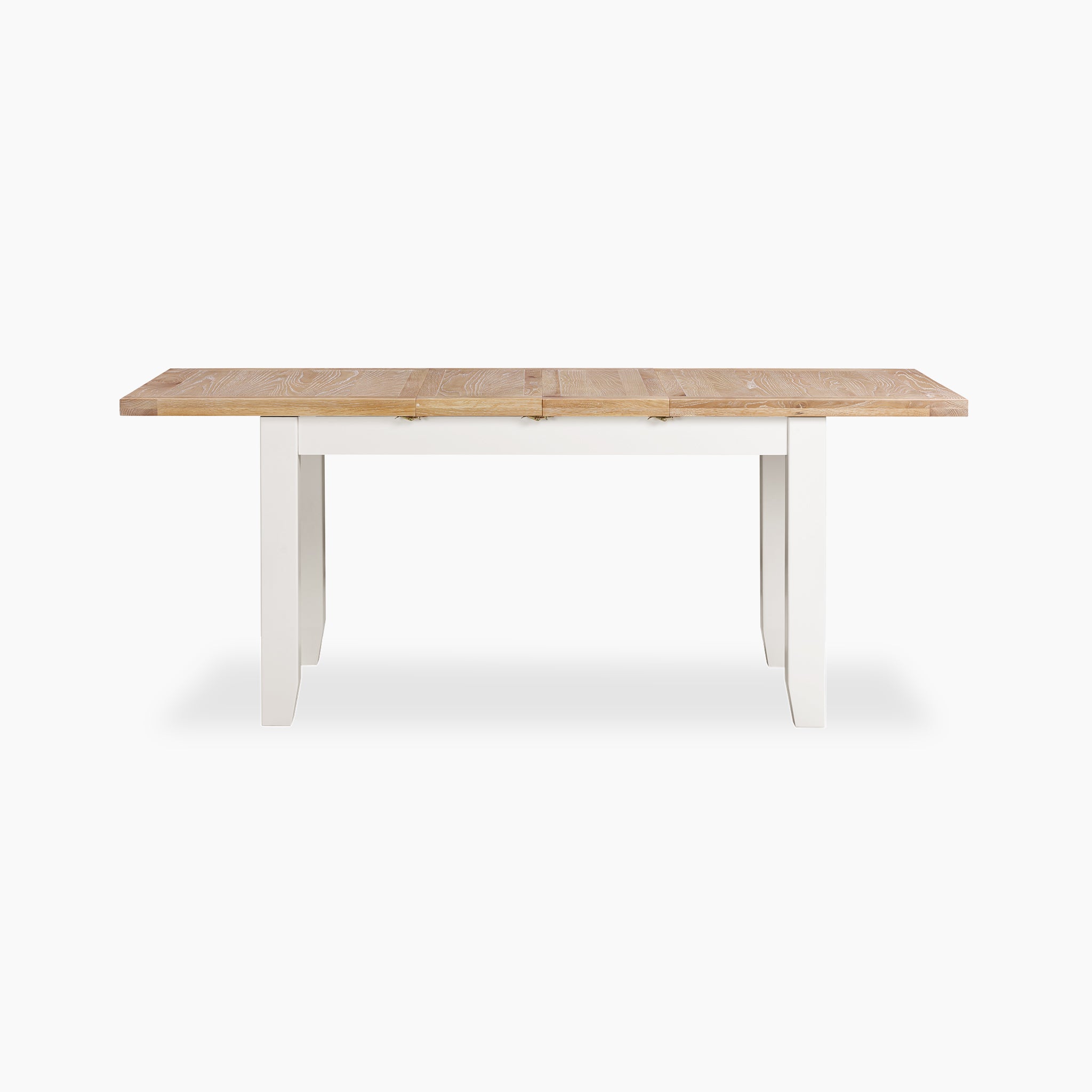 The Burford 6 Seat Extending Dining Set in Warm White showcases a wooden dining table with a light brown top and crisp white legs, beautifully highlighted against a pristine white background.
