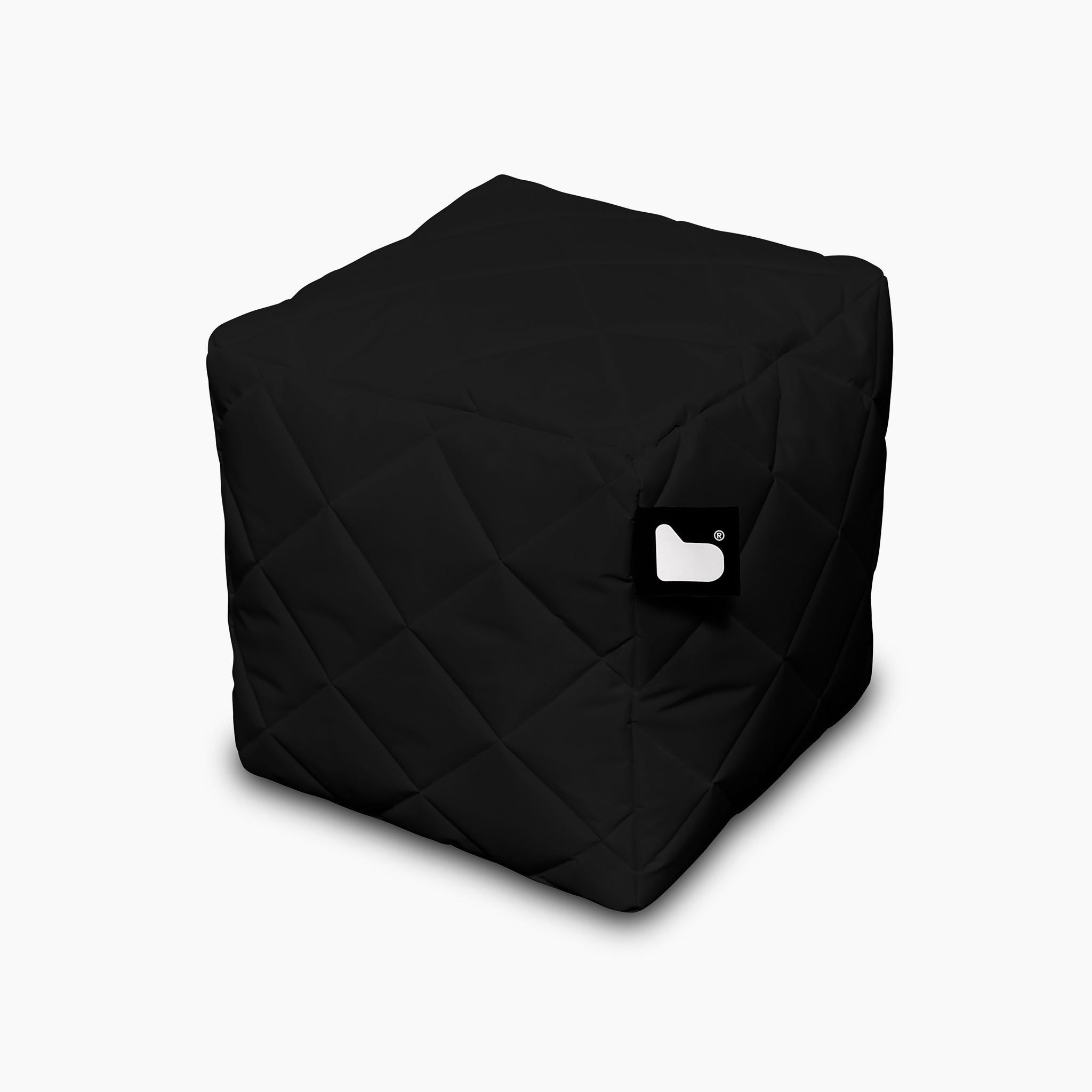 A black Outdoor Quilted B-Box with a simple logo tag on one side, perfect for extreme lounging against a white background.