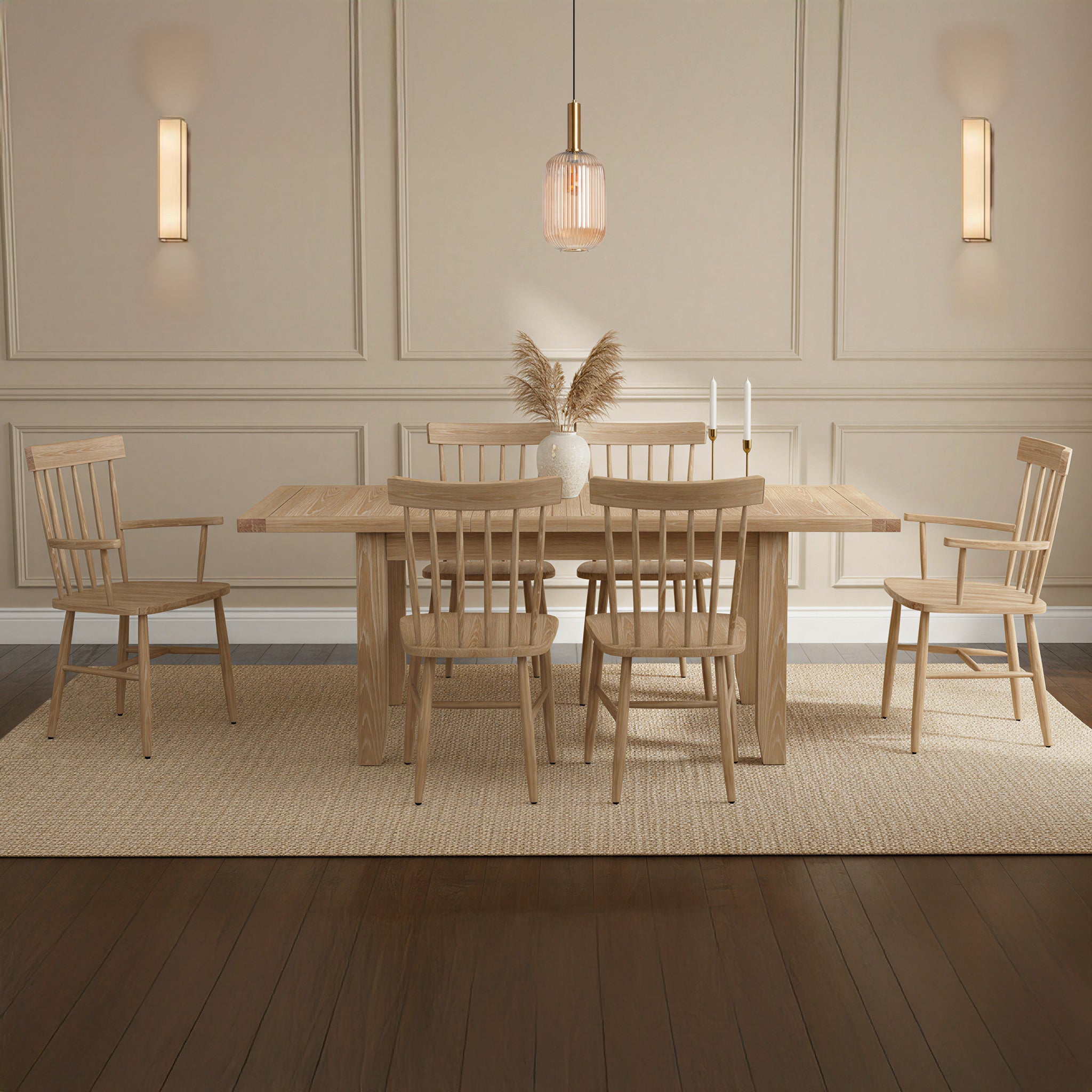 Minimalist dining room featuring the Burford 6 Seat Extending Dining Set with Spindleback Dining and Armchairs in Natural Oak, complemented by a cozy rug and neutral wall decor.