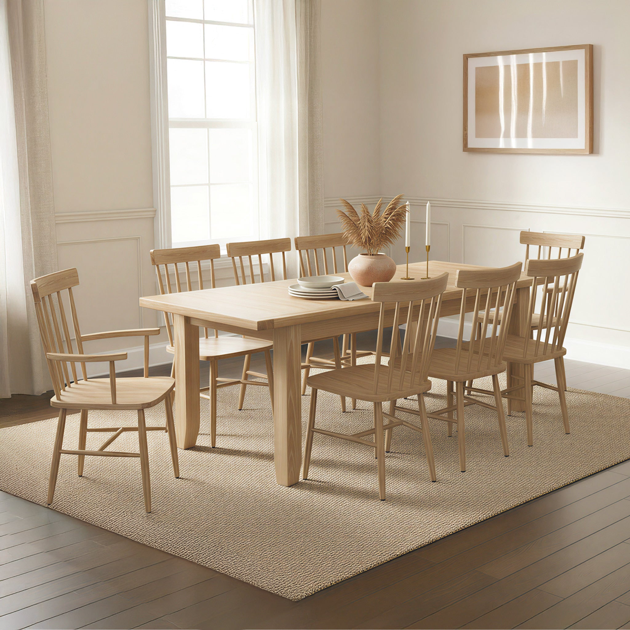 The Burford 8 Seat Extending Dining Set with Spindleback Dining and Armchairs in Natural Oak sits on a rug in a bright, modern dining room with a large window.
