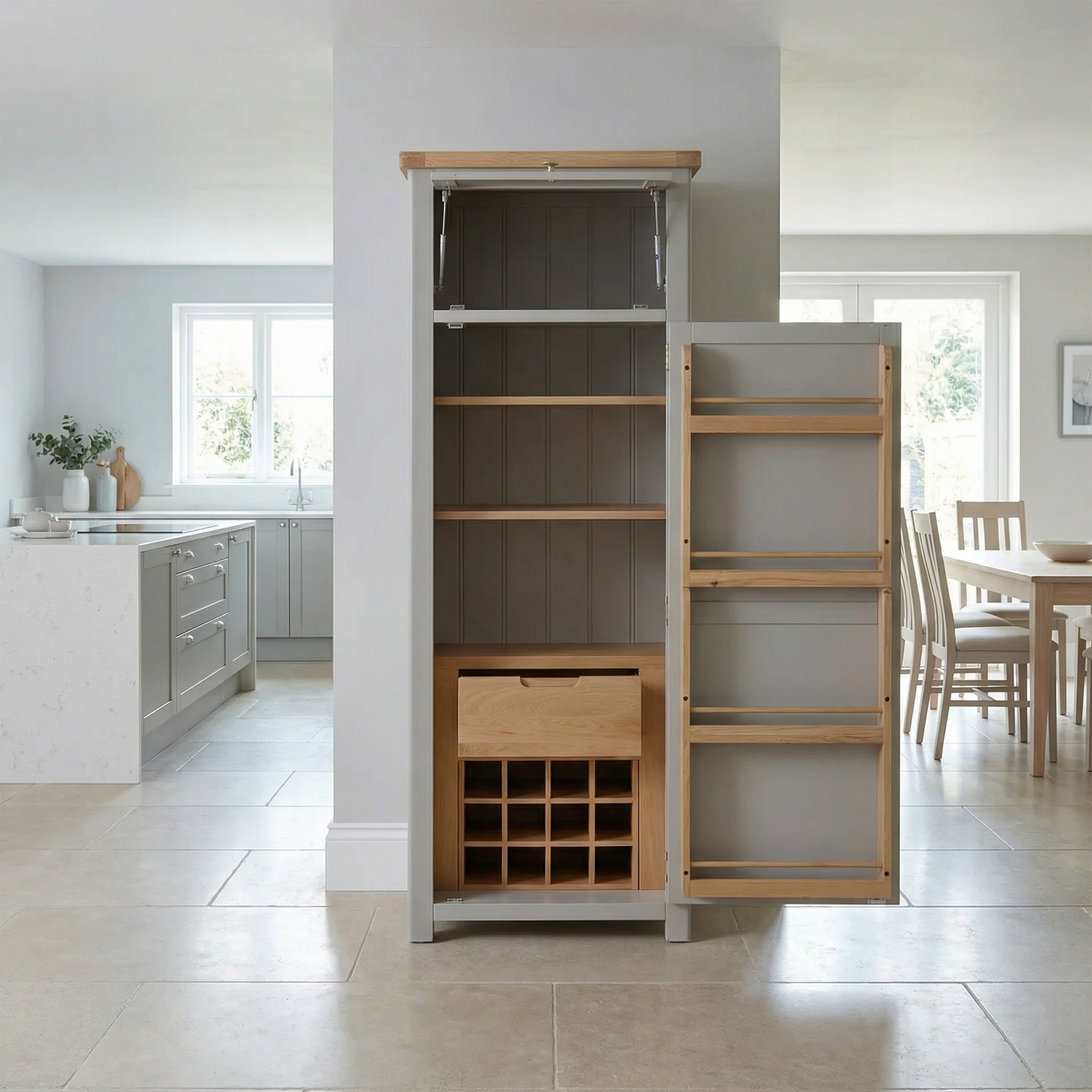 The Burford Single Larder Unit in Pebble Grey offers versatile kitchen storage with shelves, a wine rack, and door racks, featuring natural oak accents inspired by elegant design—perfect for bright kitchen and dining areas.