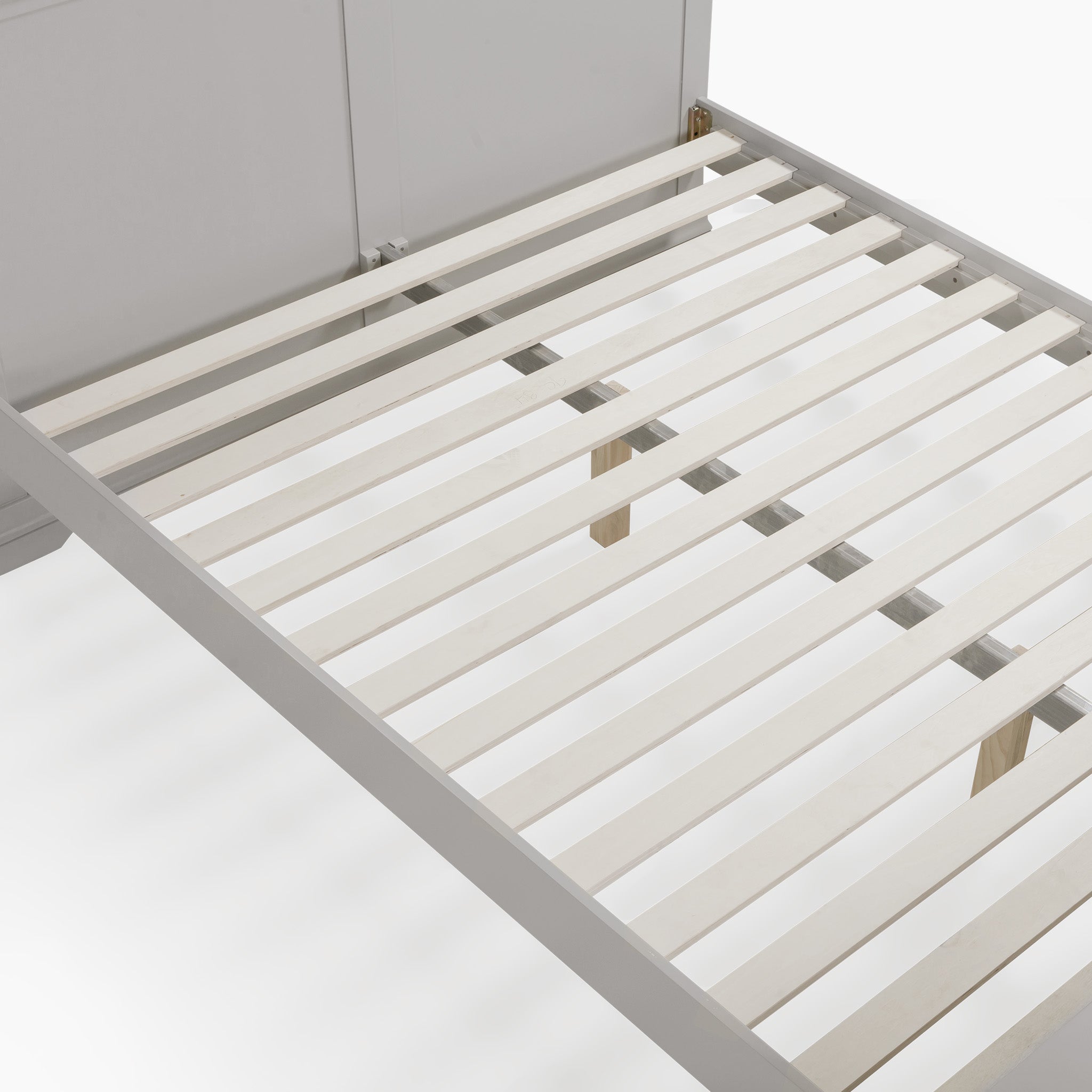 The Chalbury 5ft High-End Kingsize Bed Frame in Pebble Grey features a contemporary design with wooden slats and extends elegantly from a cabinet.