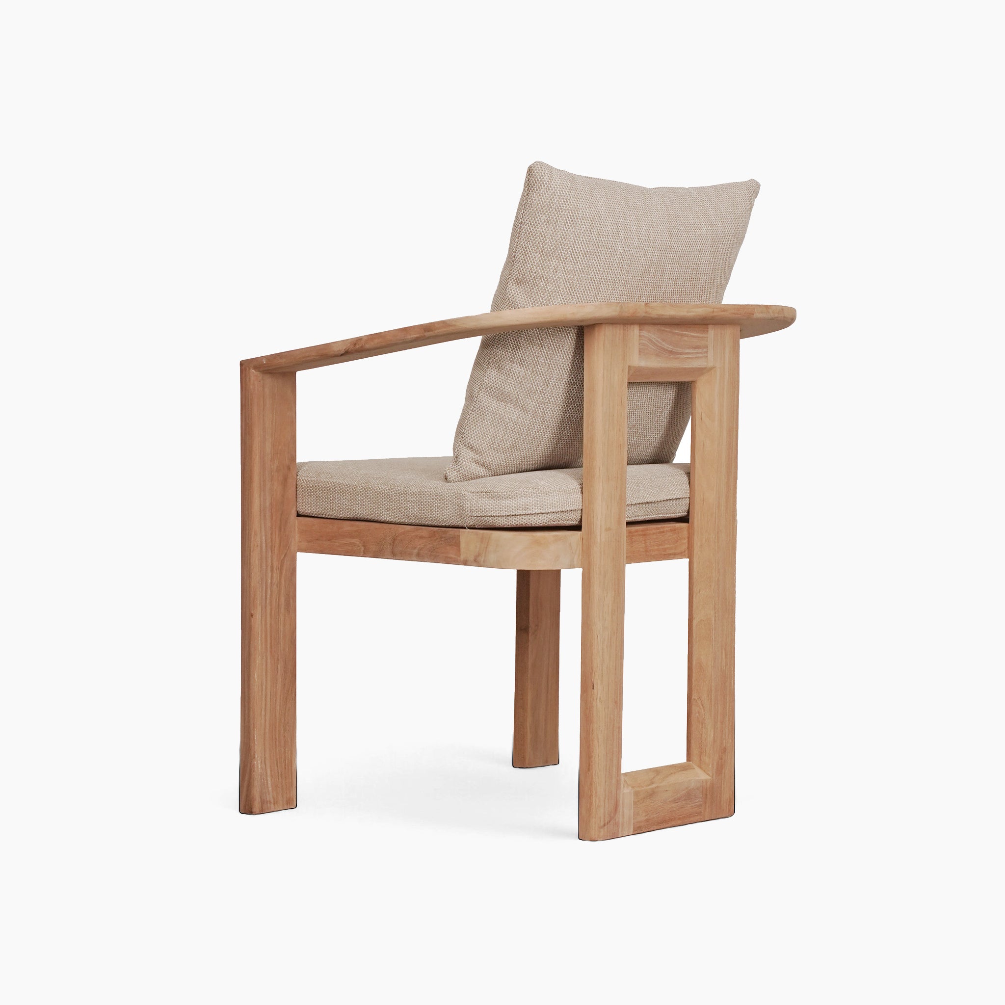 The Tivoli Dining Set includes a teak wood armchair with light beige cushions, curved backrest, and an open rectangular frame design.