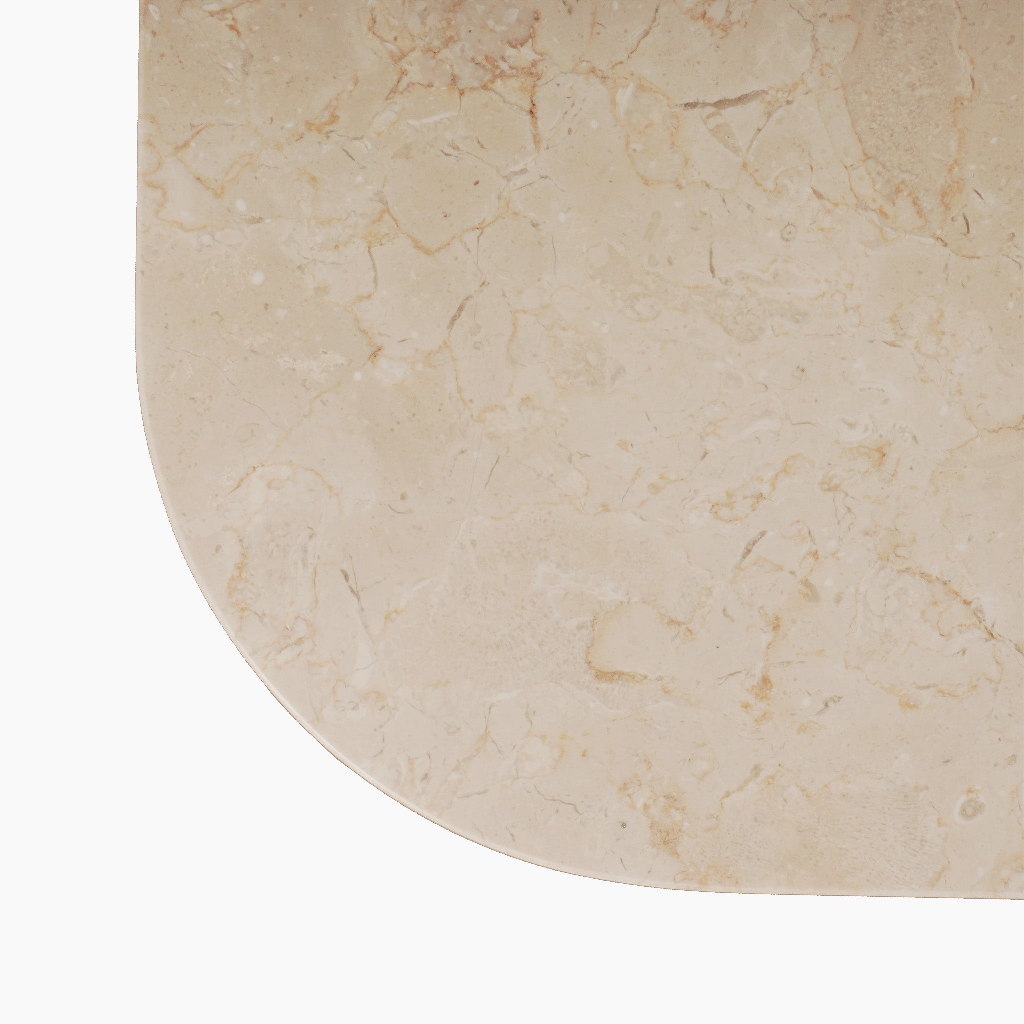Close-up of the Tivoli 6 Seat Dining Set's fawn marble dining table, showcasing its beige surface with a rounded corner and natural veining patterns.