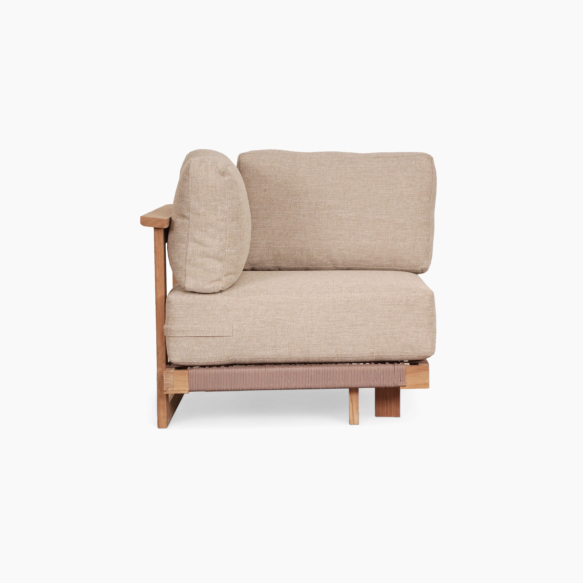 The Tivoli Large Corner Set in Fawn, featuring a cushioned sofa with one armrest and a sturdy teak frame, pairs elegantly with its accompanying marble coffee table for a sophisticated living room ensemble.