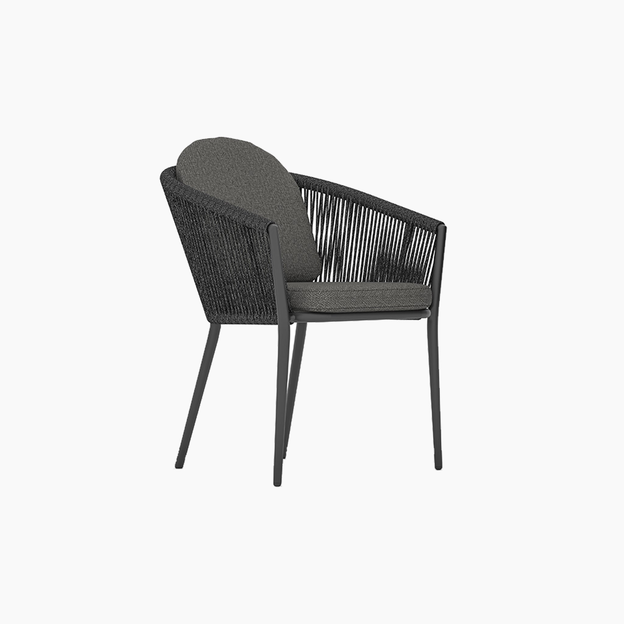 Black woven armchair with dark gray cushions, ideal for pairing with the Ravona 8 Seat Rope Extending Dining Set (207-277cm) in Charcoal, perfect for outdoor or dining spaces.