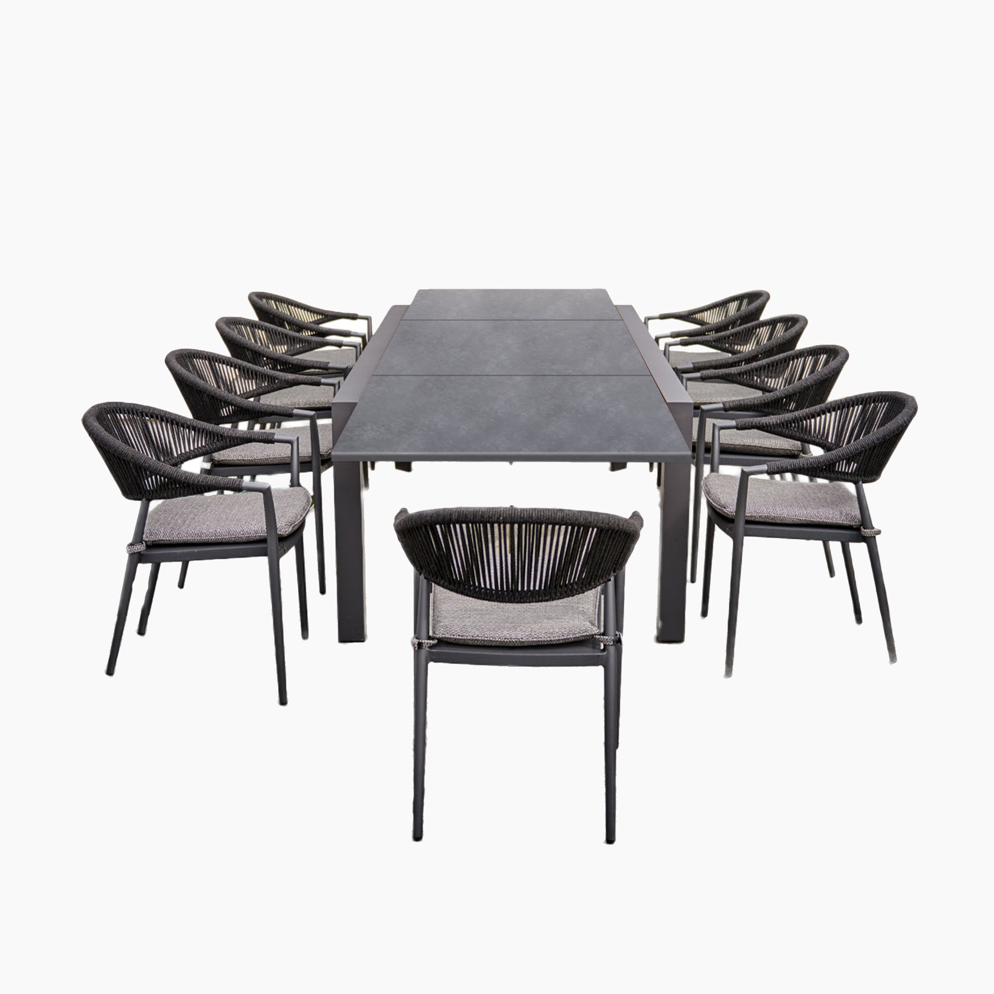 The Cloverly 8 Seat Rectangular Extending Dining Set with Ceramic Table in Charcoal features a sleek black surface and is accompanied by eight matching chairs with woven backs and removable sun-proof cushions. Crafted from weather-proof aluminum, it's perfect for both indoor and outdoor dining.