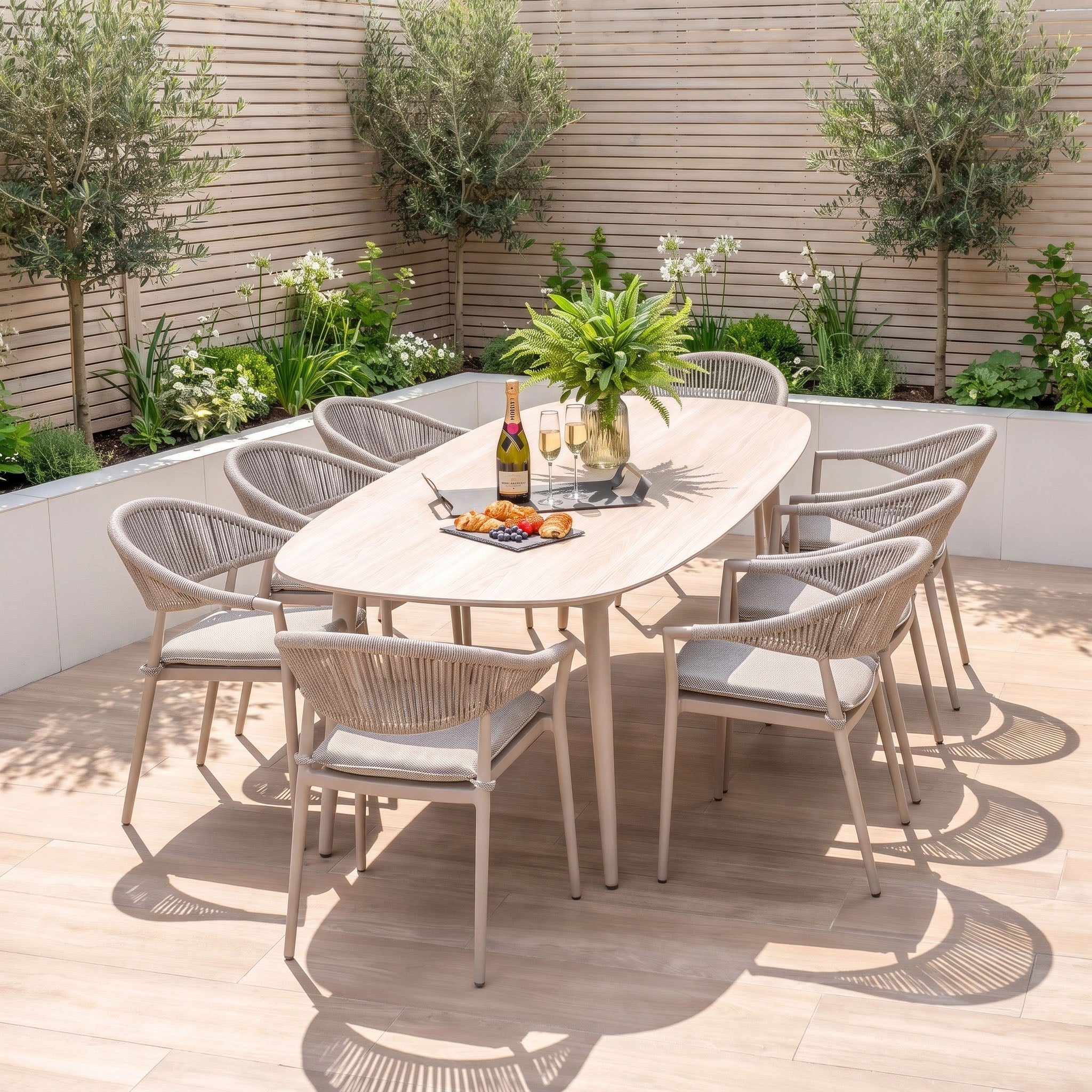 Enjoy alfresco meals in style with the Cloverly 8 Seat Dining Set featuring the Albatross Oval Dining Table in Latte—complete with eight spacious chairs, and crafted from premium Aluminium Garden Furniture for both elegance and lasting durability.