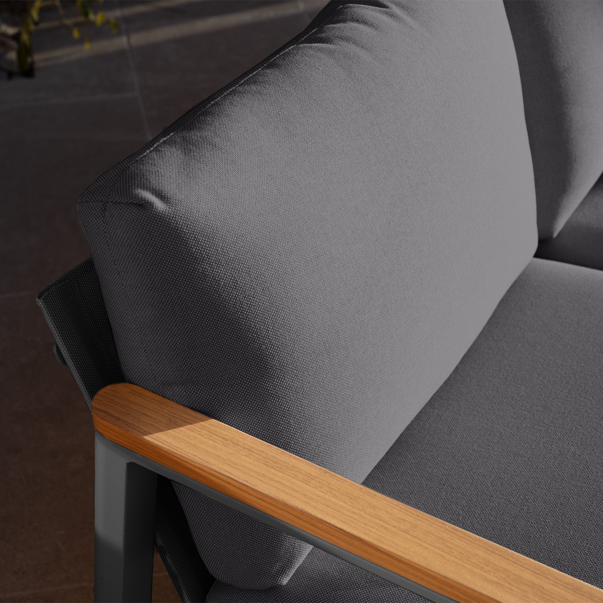 Close-up of the Cora 3 Seat Sofa Set in Grey, featuring modern gray cushions and light wooden armrests, from our weather-resistant outdoor furniture collection, photographed in natural light.