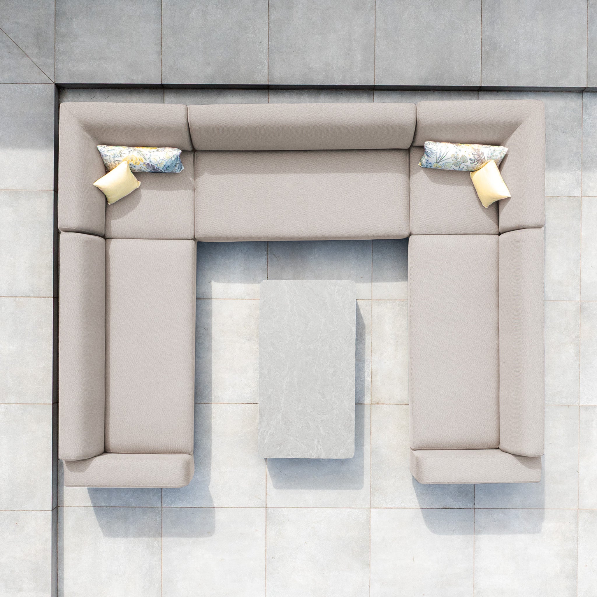 The Luna U-Shape Outdoor Fabric Sofa Set with Coffee Table in Fawn features a stylish, weatherproof beige design and durable aluminium frame, perfect for enhancing your outdoor space with comfort and elegance.