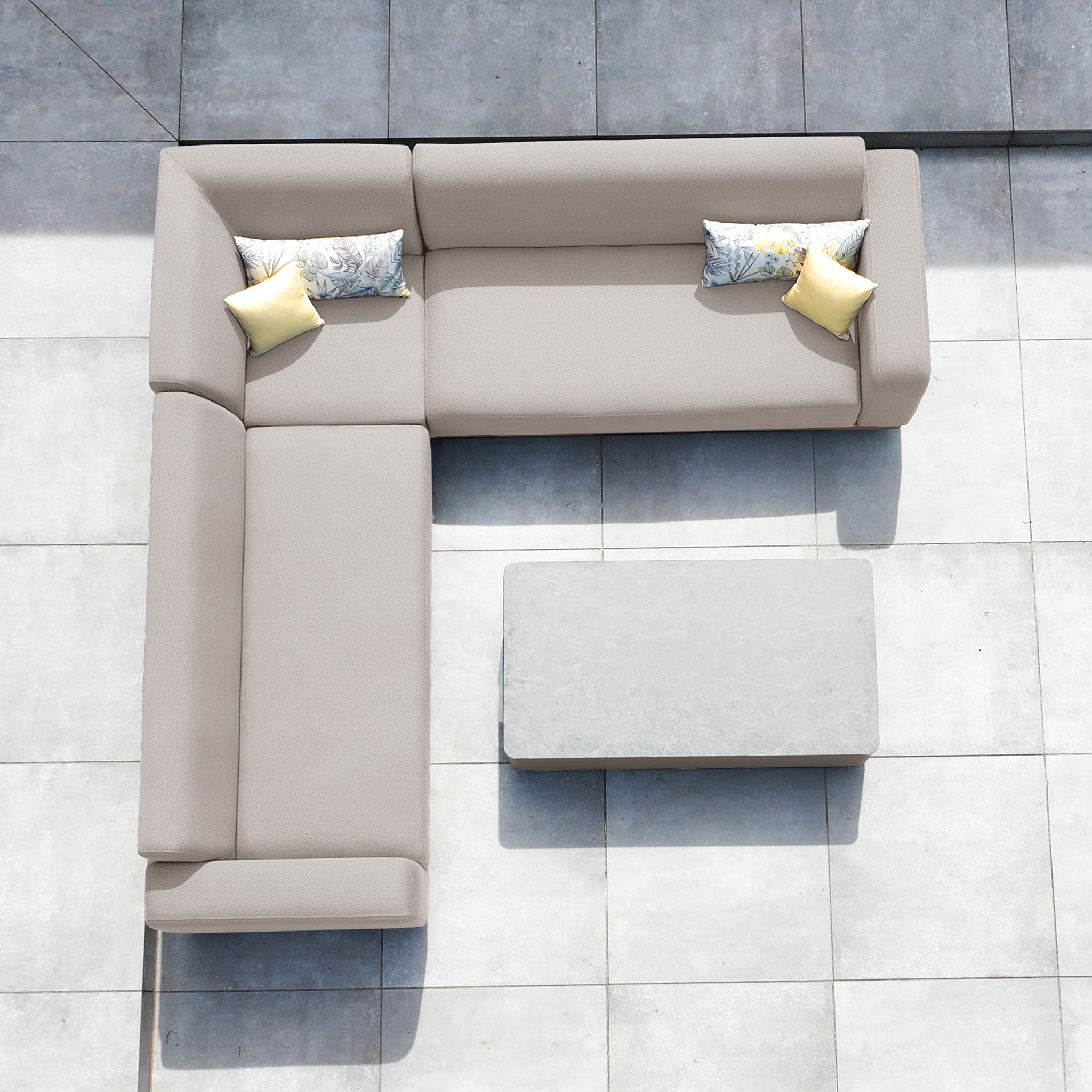 Top view of the Luna Outdoor Fabric Corner Sofa Set with Coffee Table in Fawn—an L-shaped, maintenance-free garden set with four cushions, ideal for tiled patios.