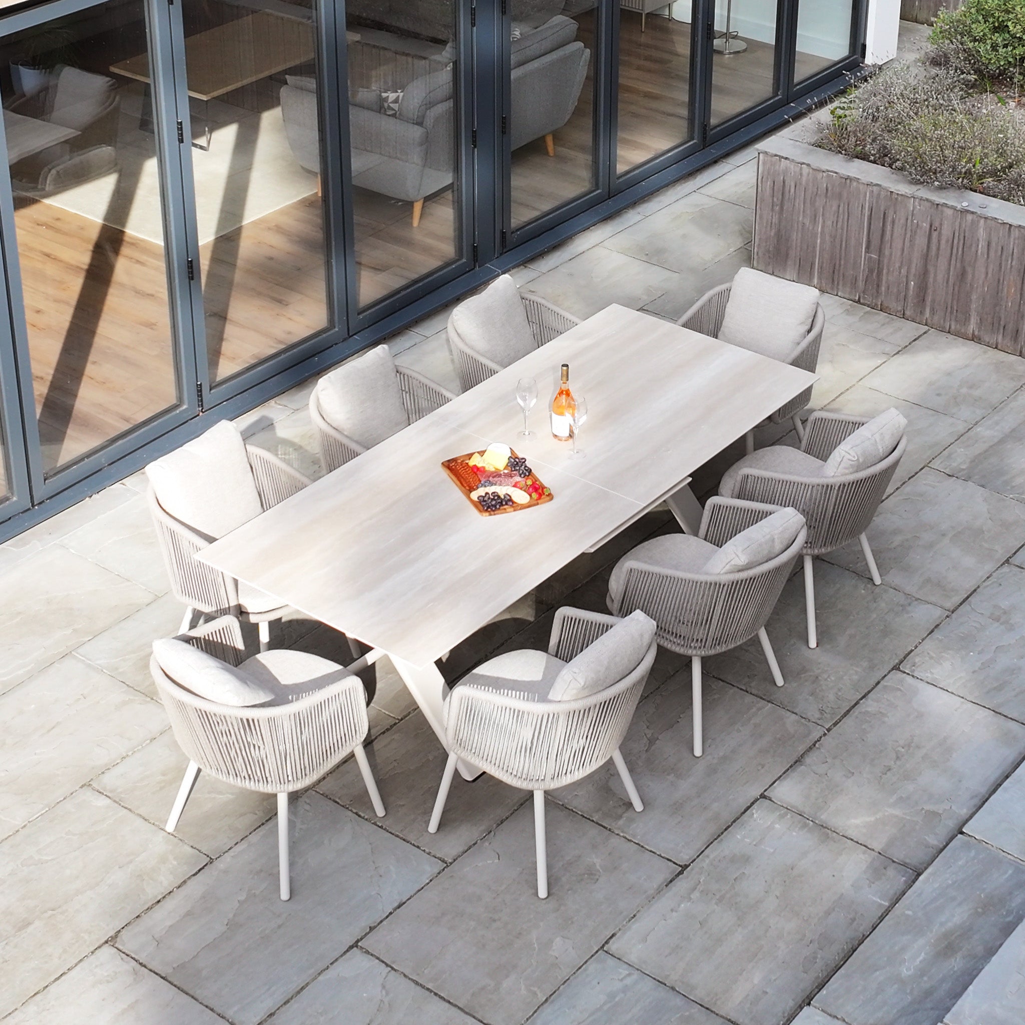 Dekota 8 Seat Rope Dining Set with Albatross Ceramic Extending Table in Fawn