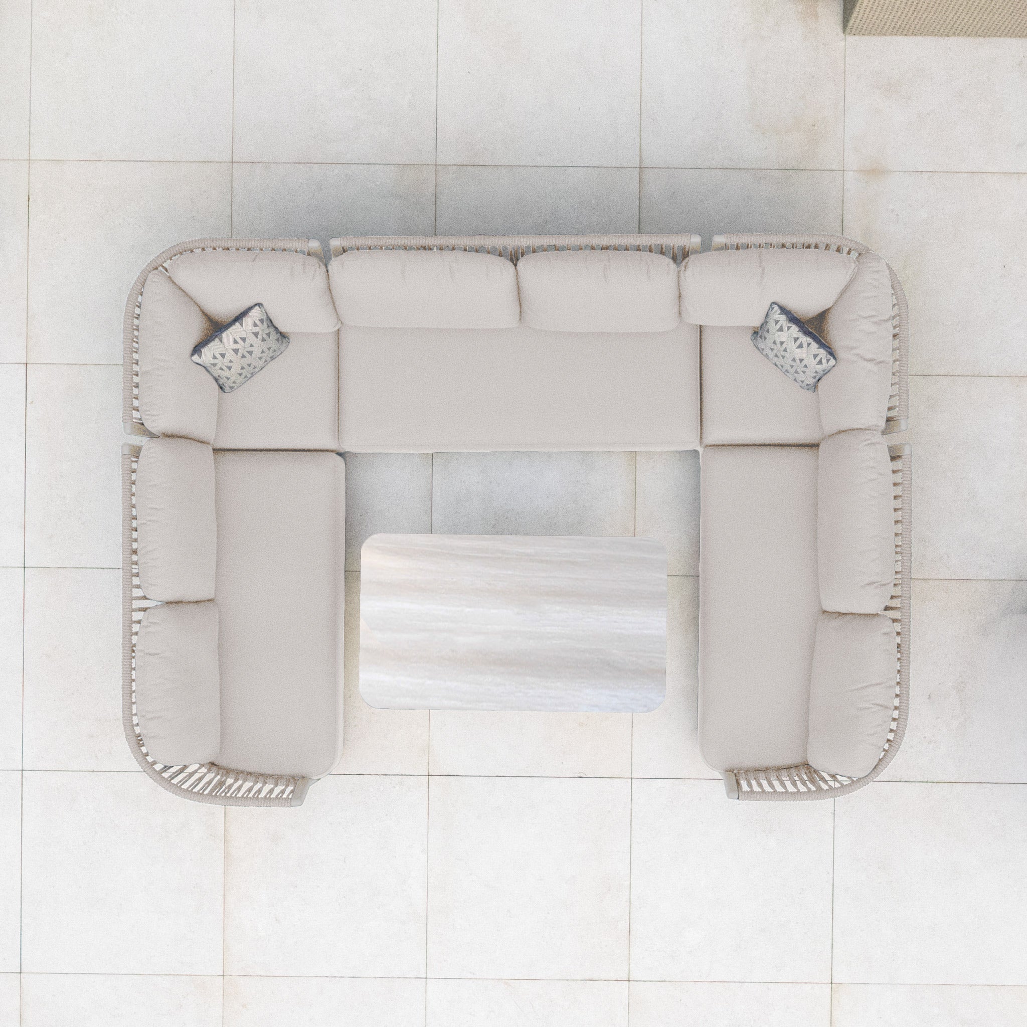 Top view of the Pello U-Shape Corner Sofa Set with Altura Rising Table in Fawn, featuring two patterned pillows—a stylish choice for outdoor furniture arrangements.