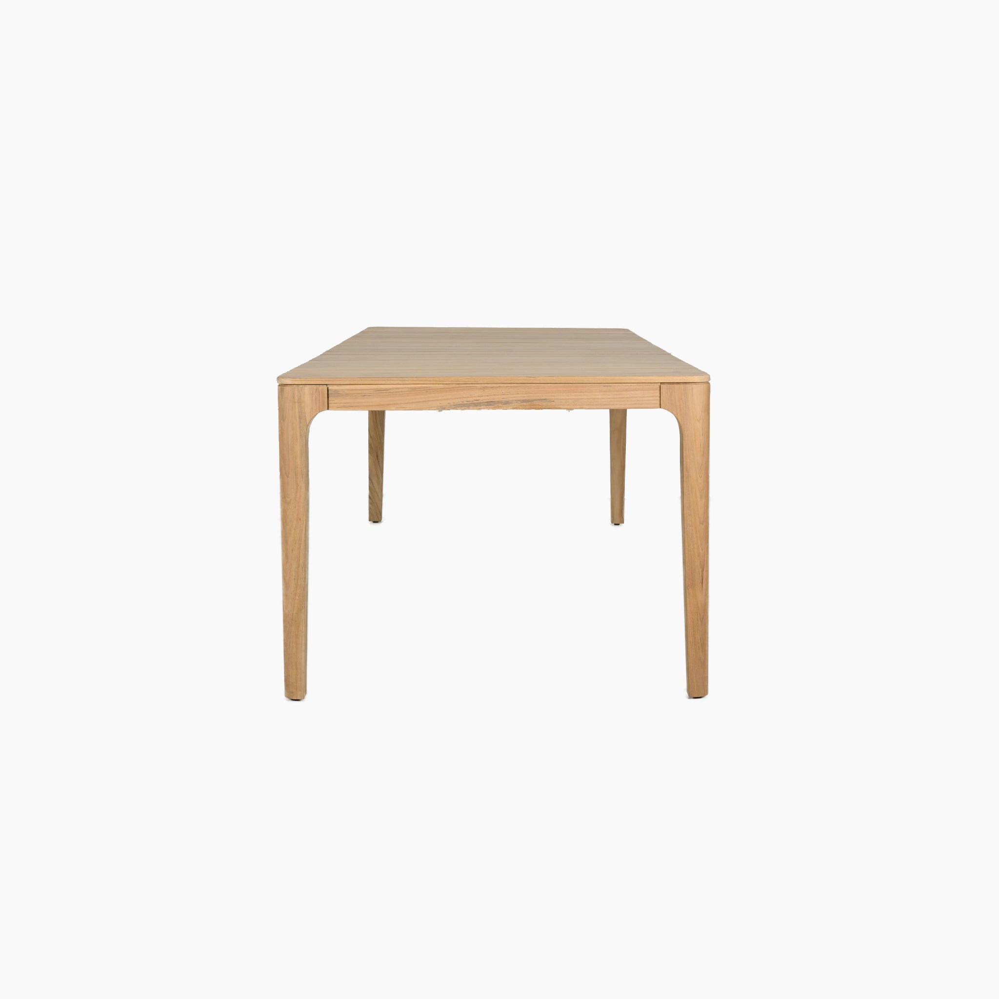 The Sora 8 Seat Rope Dining Set features a minimalist teak table viewed from the end, showcasing exquisite craftsmanship perfect for any outdoor dining set.