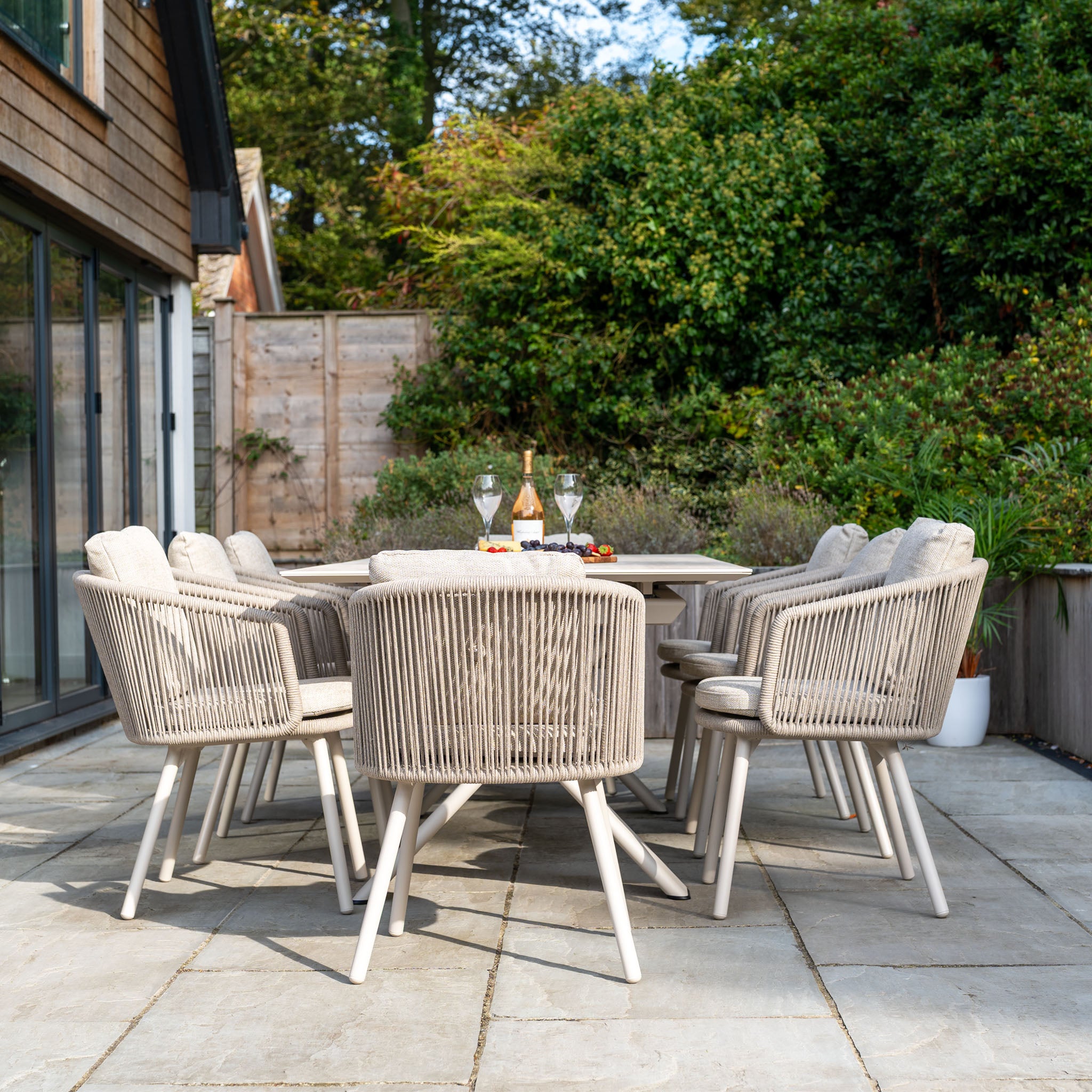 Dekota 8 Seat Rope Dining Set with Albatross Ceramic Extending Table in Fawn