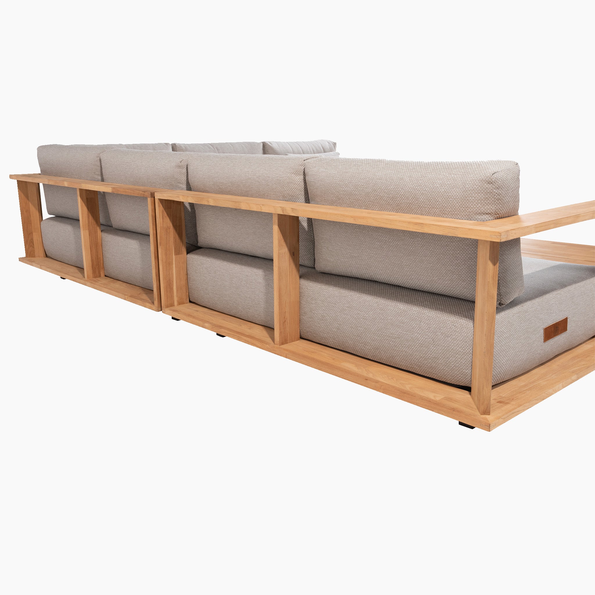 Back view of the Eternity Right Hand Teak Corner Group in Light Grey, featuring extra thick lounge cushions, a wooden frame, and open storage space behind the cushions.