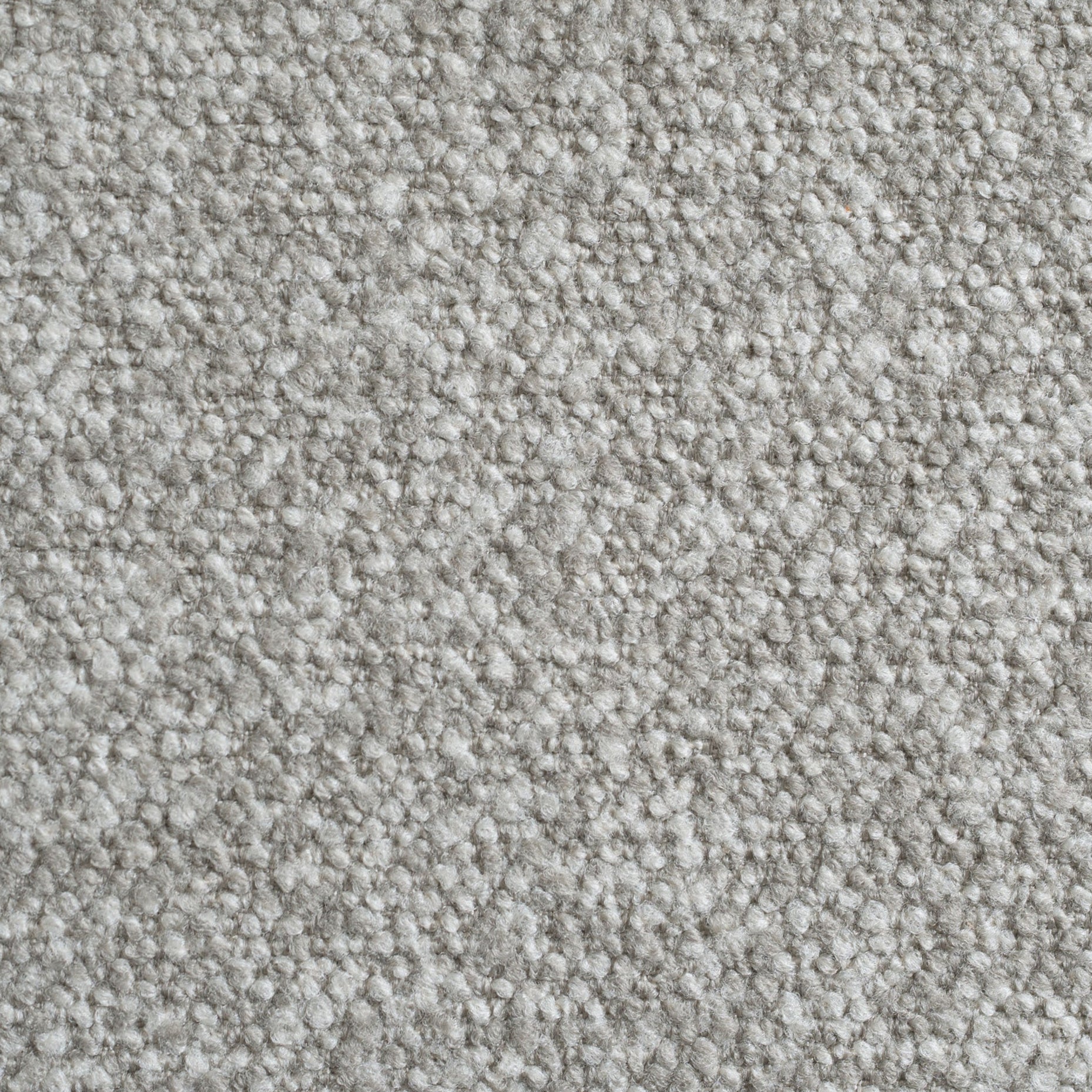 Close-up of Truffle Fabric in light gray, featuring a soft, looped pile texture.