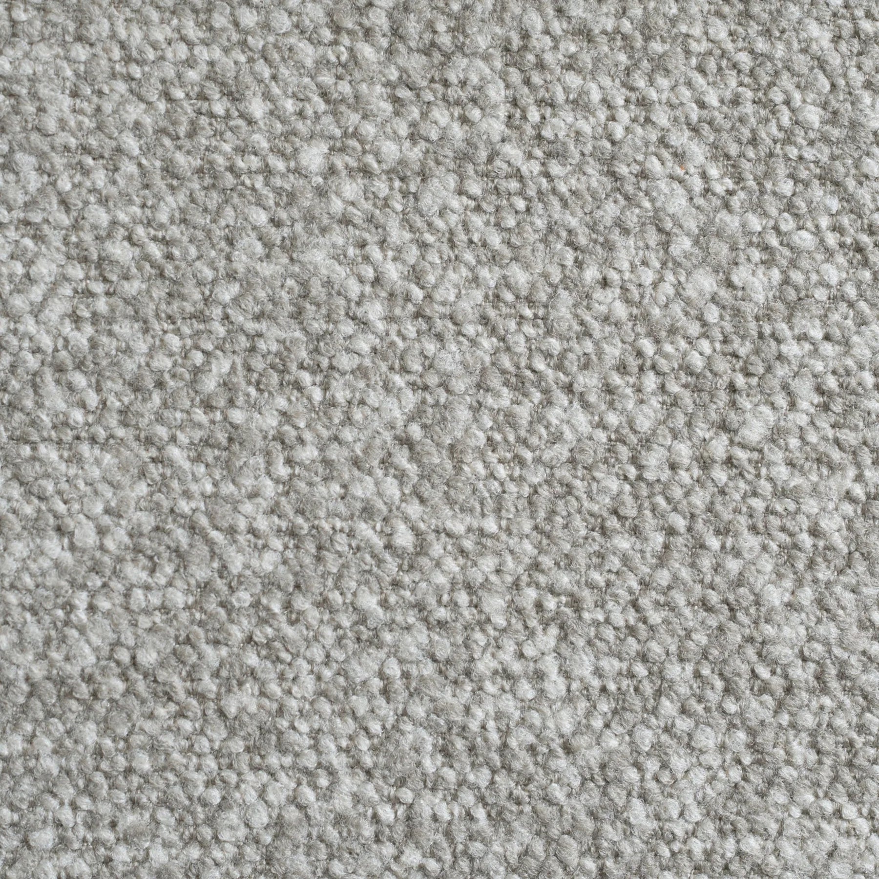 Close-up of light gray, textured carpet with a soft, looped fiber pattern—ideal for pairing with the Como Corner Sofa Set in Truffle or placing beneath a modern teak coffee table.