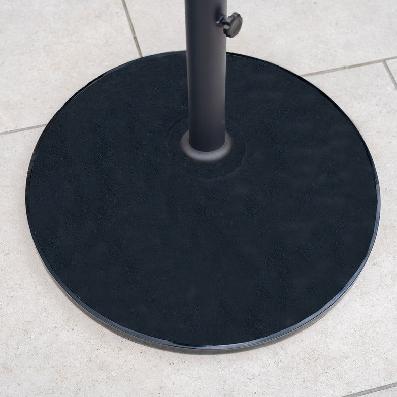 The 50kg Concrete Parasol Base with center pole support is shown placed on a light-colored tiled floor.