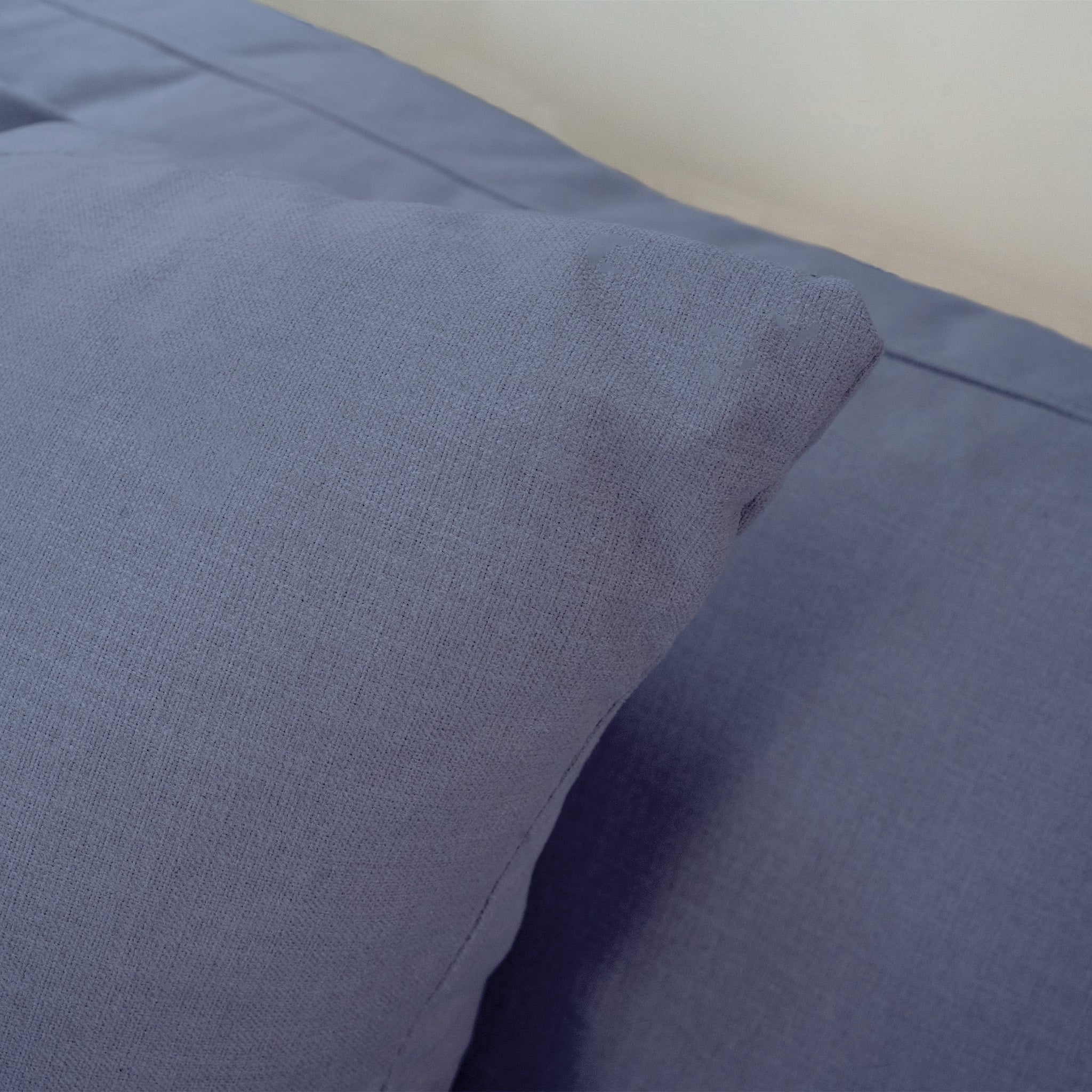A close-up of the Hampshire Modular 4 Seat Sofa in Midnight Blue, neatly arranged and featuring plush duck feather and down cushions.
