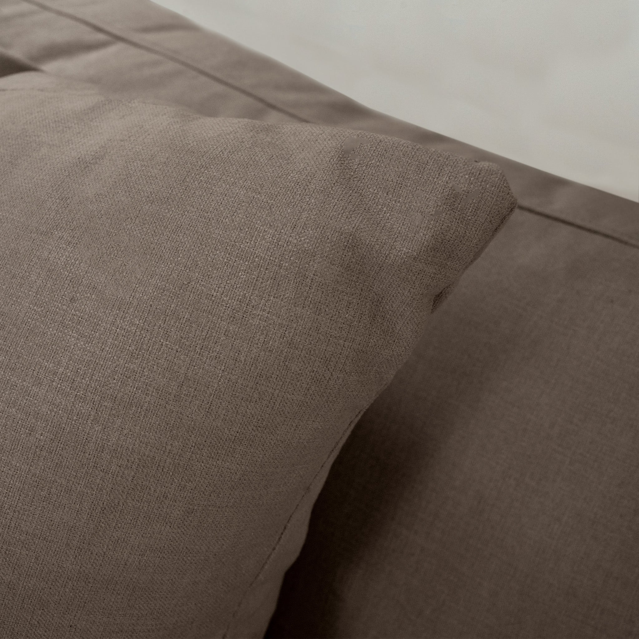 Close-up of the Hampshire Modular 2 Seat Sofa in Cocoa, highlighting the plush comfort and elegant design reminiscent of luxurious cushions.