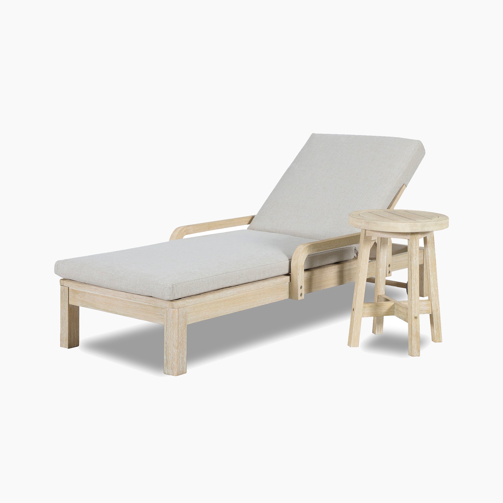 The Quay Sun Lounger in Mocha, featuring a beige cushion, is ideal as outdoor furniture and pairs well with a small round wooden side table.