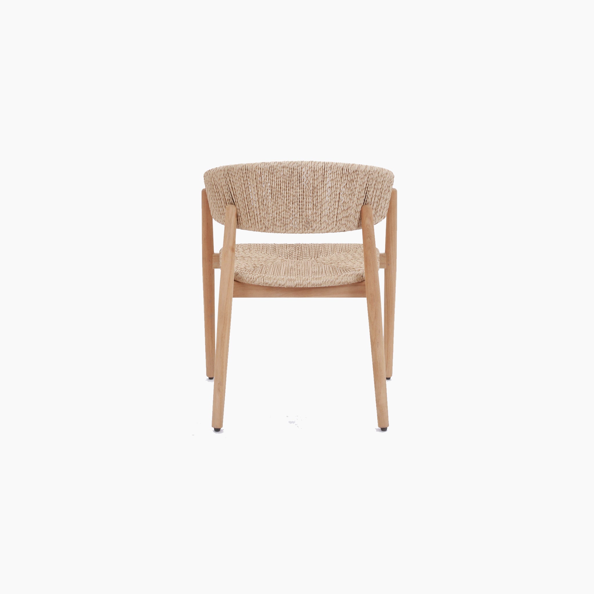 From the back, a wooden chair with a woven seat and backrest complements the white backdrop, beautifully harmonizing with the Lucca 8 Seat Dining Set with Ceramic Top Table in Natural Weave.
