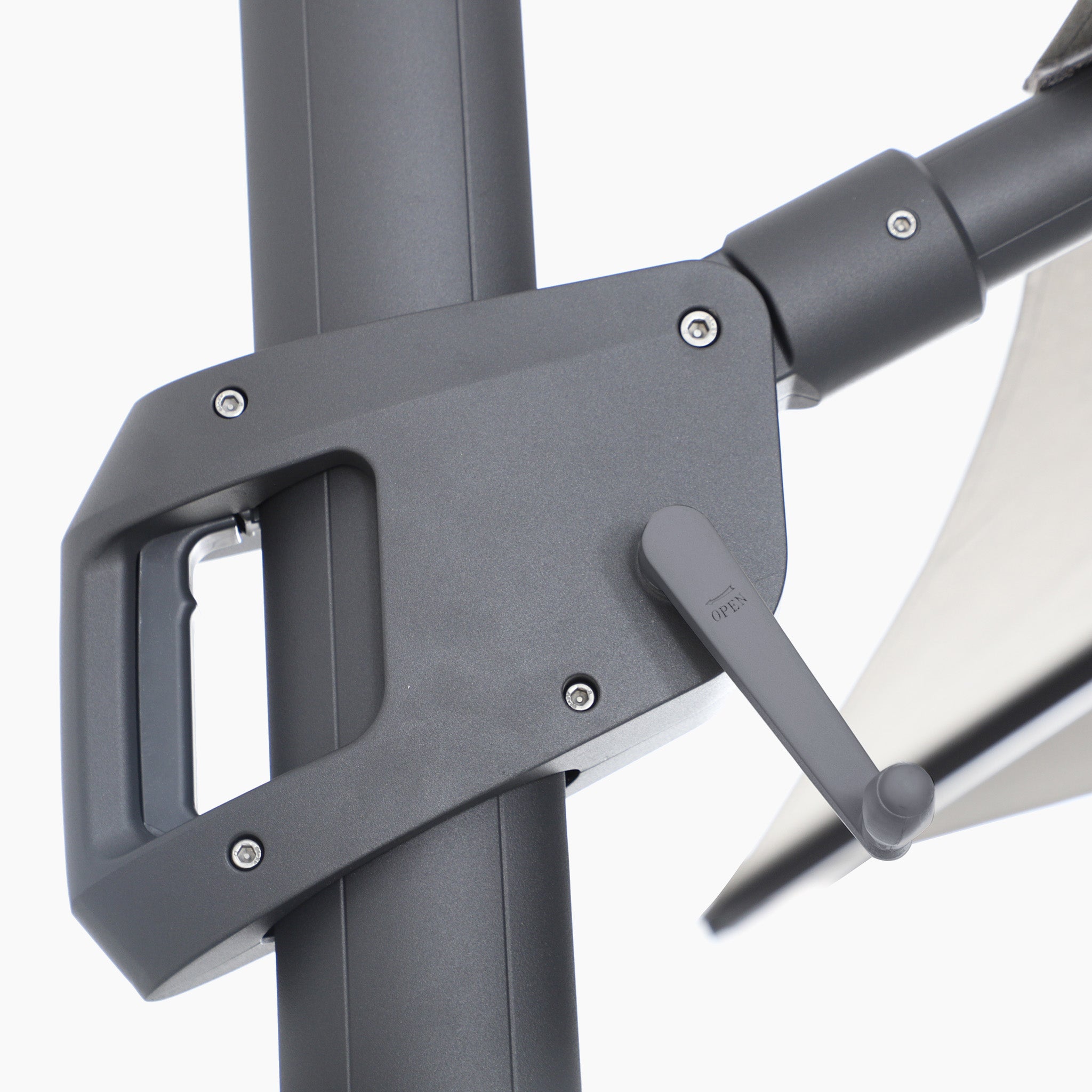 Close-up of the crank handle on the Volos 3m x 3m Square Cantilever Parasol with LED Lighting in Slate, shown attached to the aluminium pole with part of its UV resistant canopy and 120kg granite base visible.