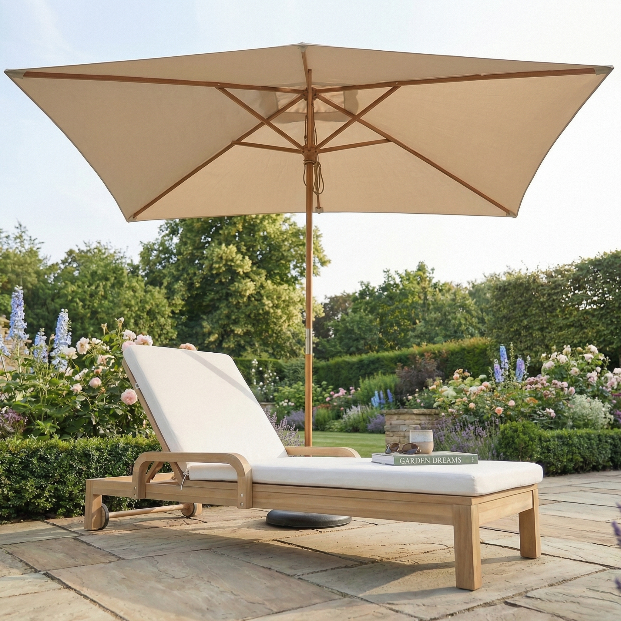 Wooden lounge chair with white cushion under a Kratos 3m x 2m Rectangular Wooden Parasol in Beige (UV rating 50+) in a garden, book on the seat.