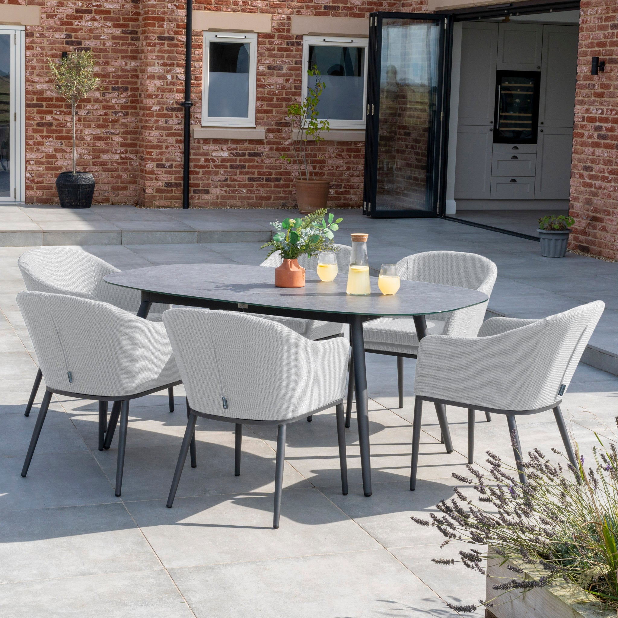 Luna 6 Seat Outdoor Fabric Oval Ceramic Dining Set in Oyster Grey