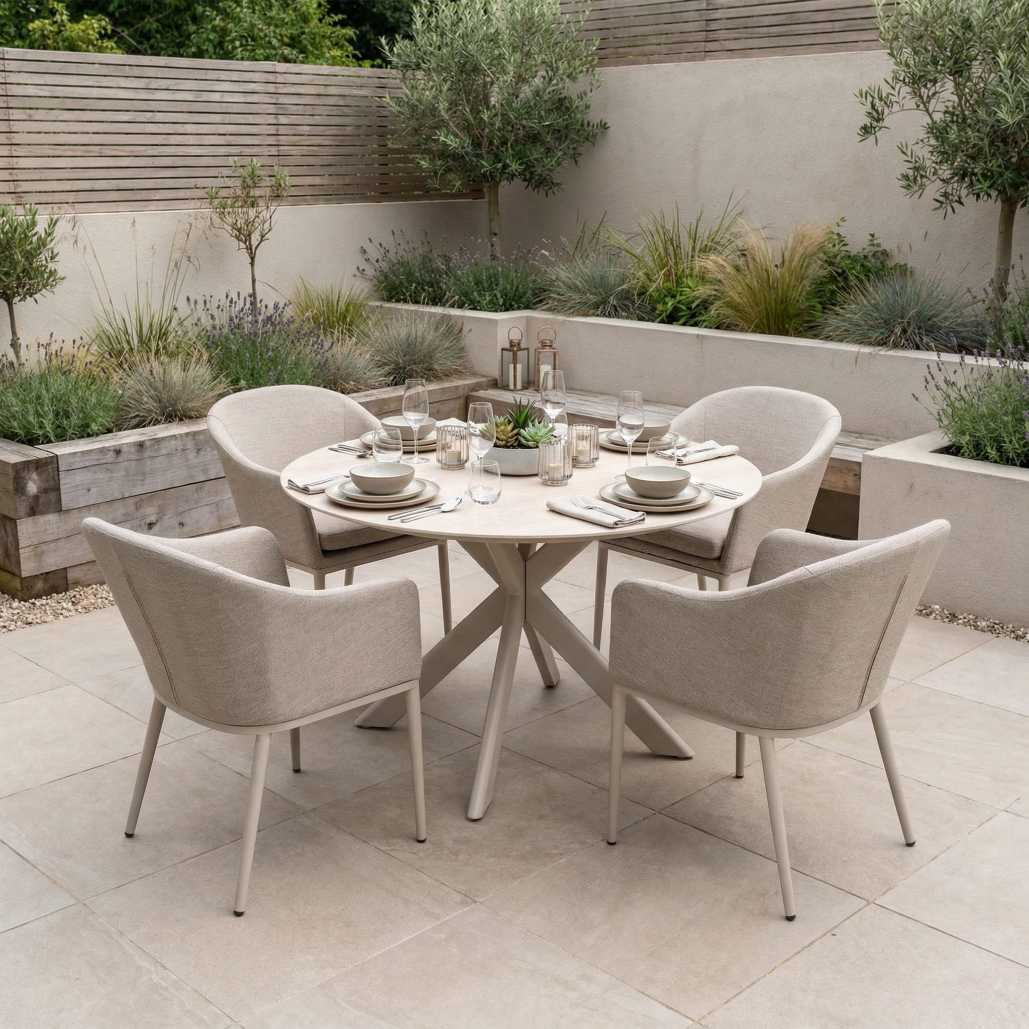 The Luna 4 Seat Round Outdoor Fabric Dining Set with Albatross Table in Fawn features four beige chairs around a round table, perfect for stylish dining in your garden.