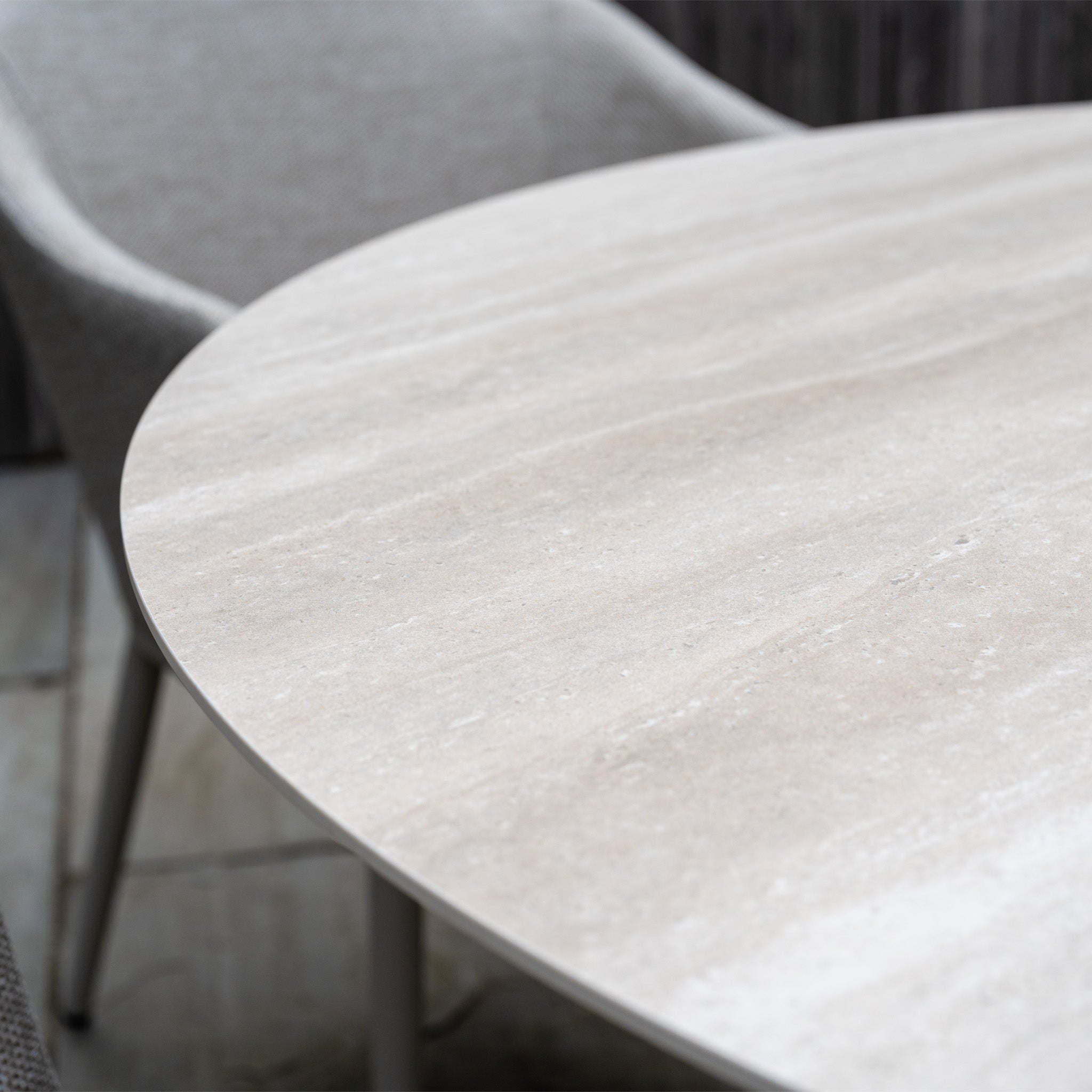 Close-up of the Luna 4 Seat Round Outdoor Fabric Dining Set with Albatross Table in Fawn, highlighting its elegant design and durable, all-weather construction.