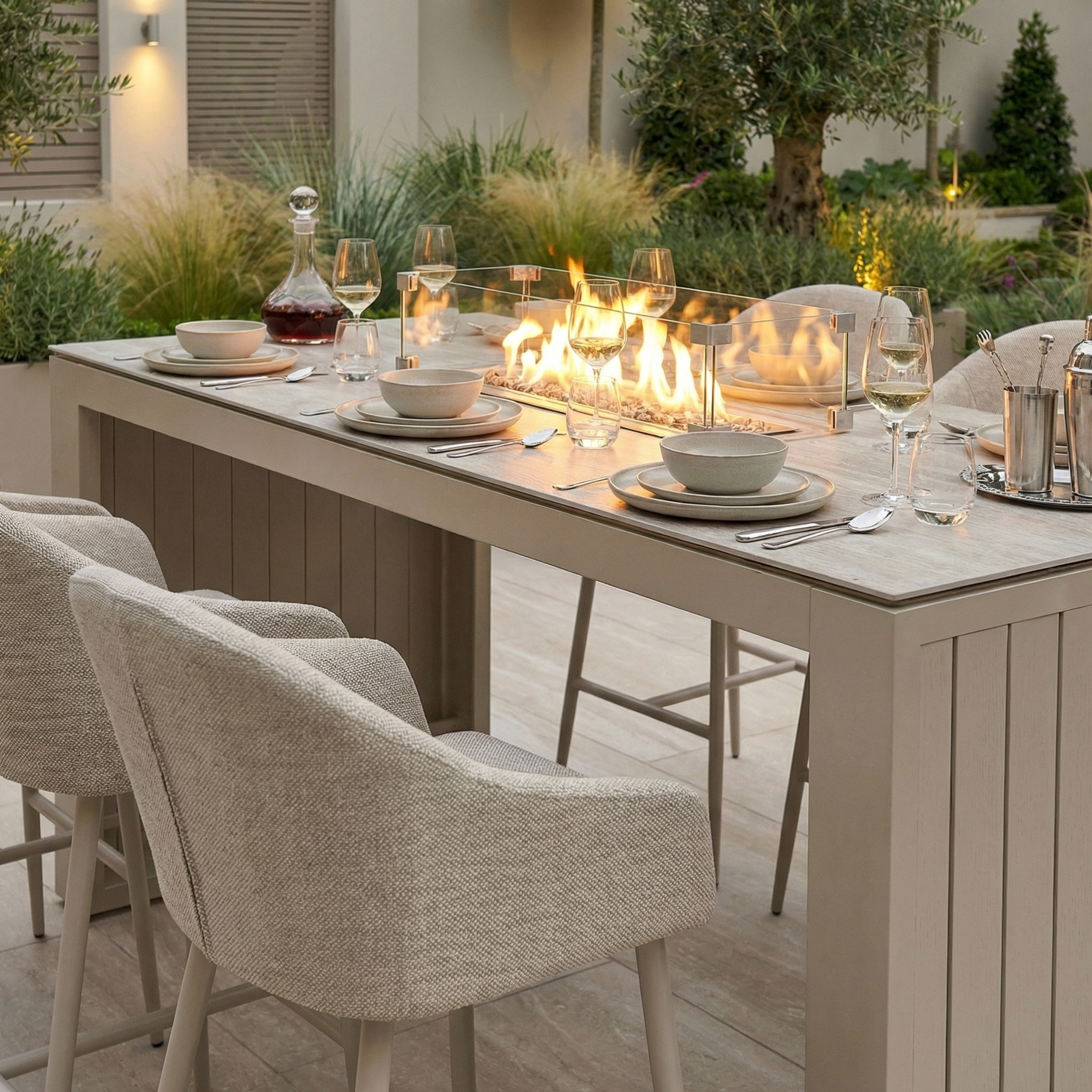 The Luna 6 Seat Outdoor Fabric Ceramic Firepit Bar Set in Fawn features cozy upholstered chairs and a fire feature, crafted from all-weather materials for lasting comfort—perfect for stylish outdoor dining and entertaining.