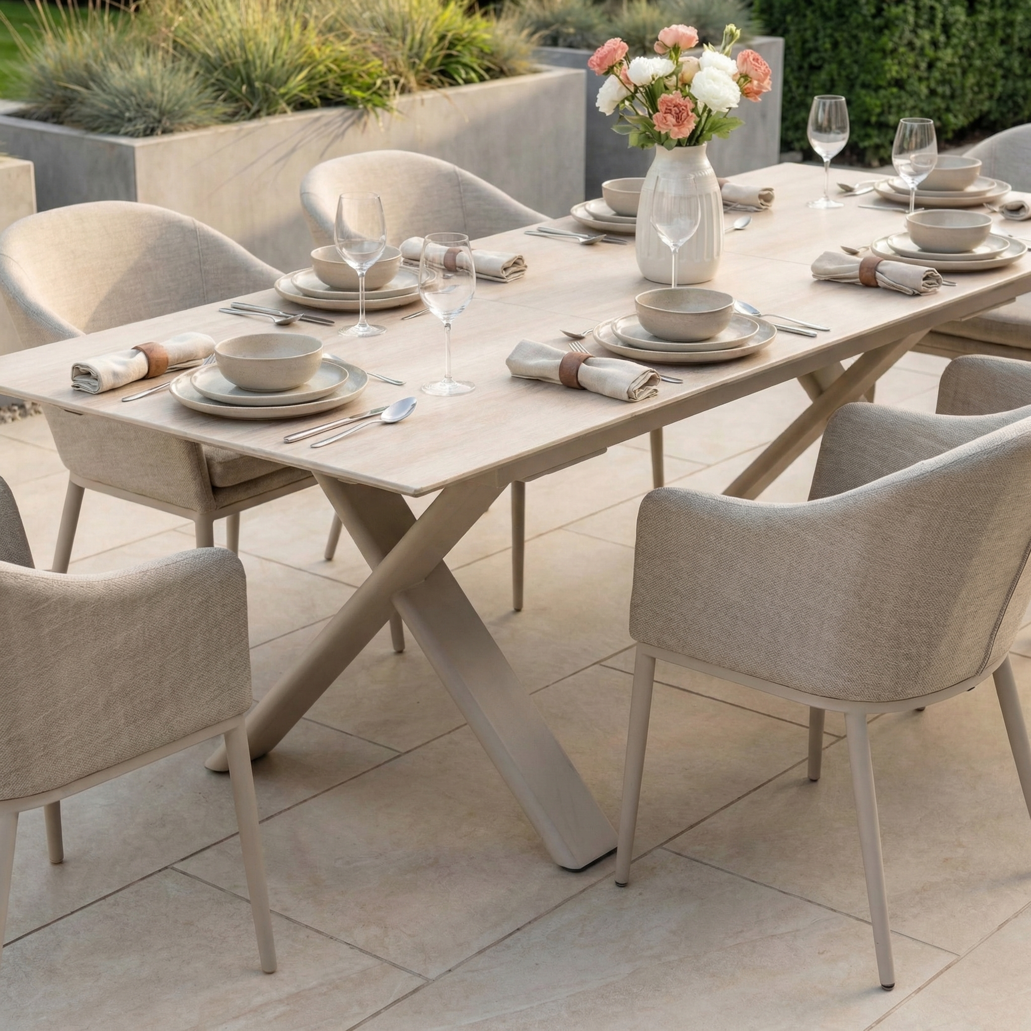 The Luna 6 Seat Outdoor Fabric Dining Set with Albatross Extending Table in Fawn includes all-weather beige chairs, perfect for elegant outdoor dining for six.