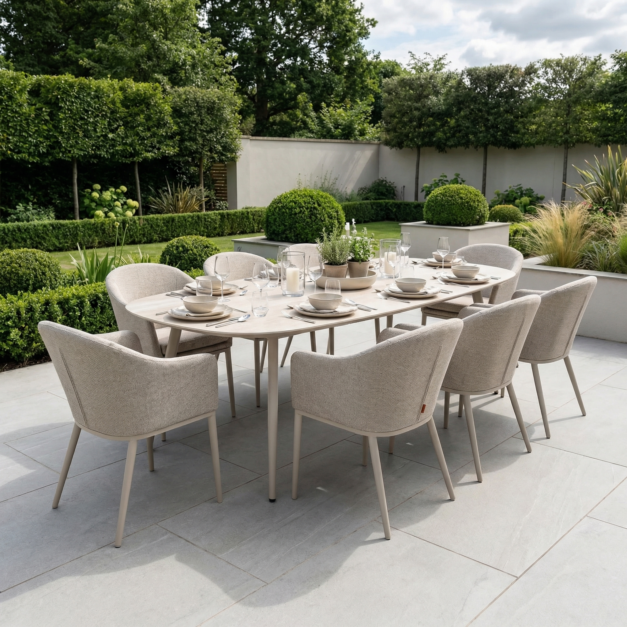 The Luna 8 Seat Outdoor Fabric Oval Ceramic Dining Set in Fawn features a stain-resistant table and eight chairs, ideal for stylish dining on your garden patio.