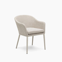 The Luna Dining Chair in Fawn (2pcs) features modern beige upholstery and slim metal legs, shown on a white background.