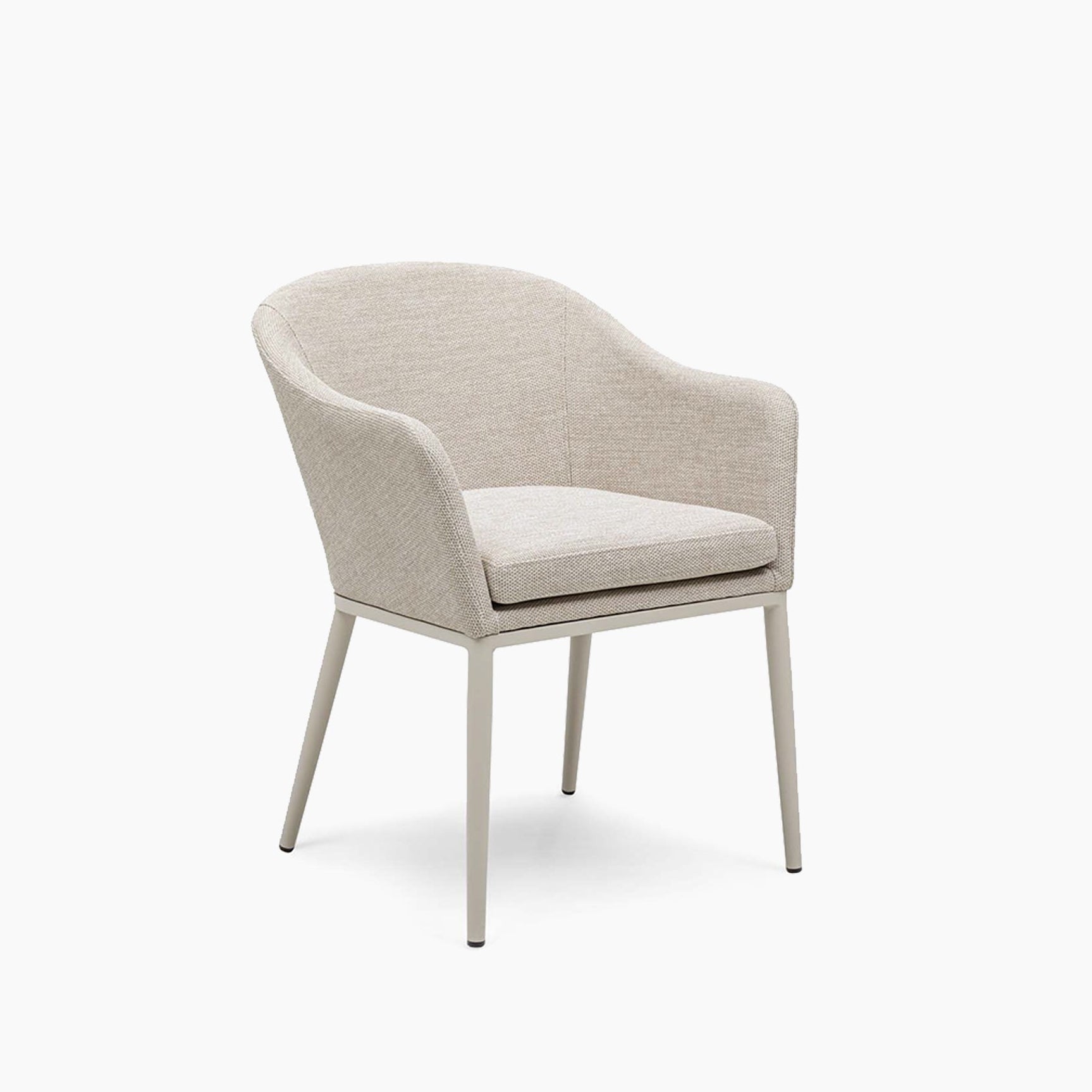A modern beige upholstered armchair with a curved backrest and slim angled legs, ideal for pairing with the Luna 10 Seat Outdoor Fabric Extending Teak Dining Set in Fawn against a white background.