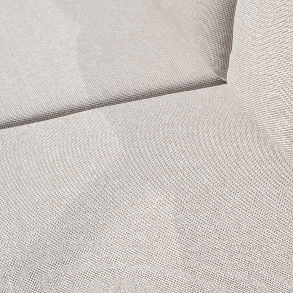 Close-up of a beige cushion highlighting texture and seams, part of the Luna U-Shape Outdoor Fabric Curved Corner Group with Round Firepit Coffee Table in Fawn—an elegant all-weather outdoor furniture set.