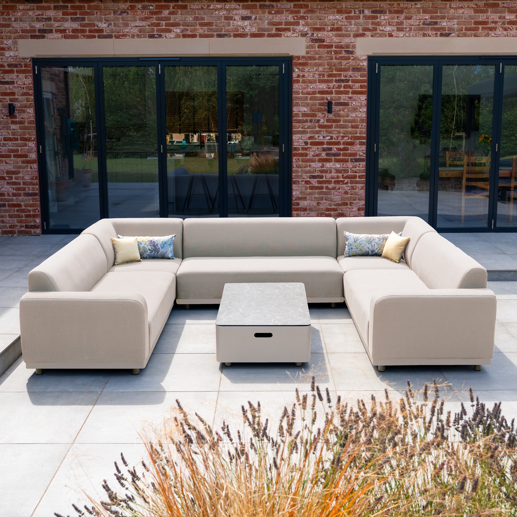 The Luna U-Shape Outdoor Fabric Sofa Set with Coffee Table in Fawn offers stylish, weatherproof seating—perfect for relaxing outdoors on your garden patio. Includes comfortable cushions and a chic coffee table.