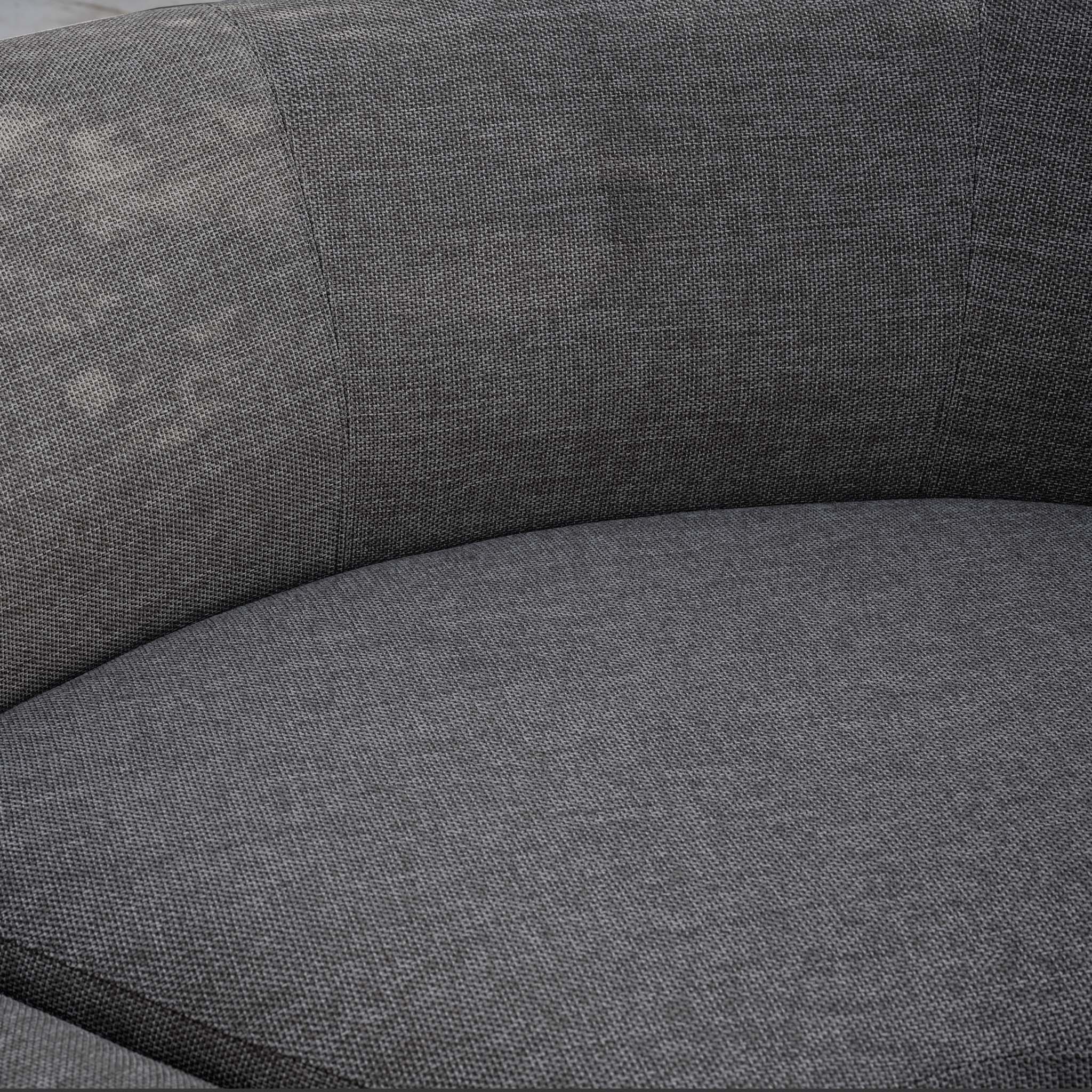 Close-up of the Luna Outdoor Fabric Large Curved Corner Sofa Set with Altura Rising Table in Grey, showing visible discoloration on the left side of the backrest.