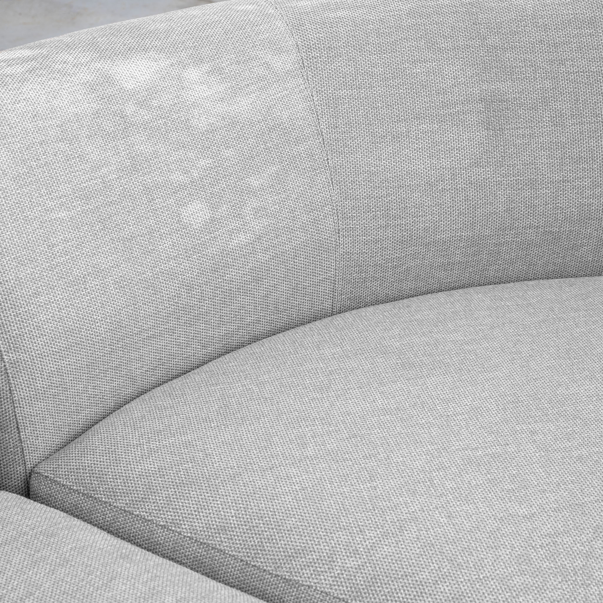 Oyster Grey Luna Outdoor Fabric Curved Corner Sofa Set with Altura Rising Table featuring a curved backrest and seat, with a subtle stain on the upper left side.