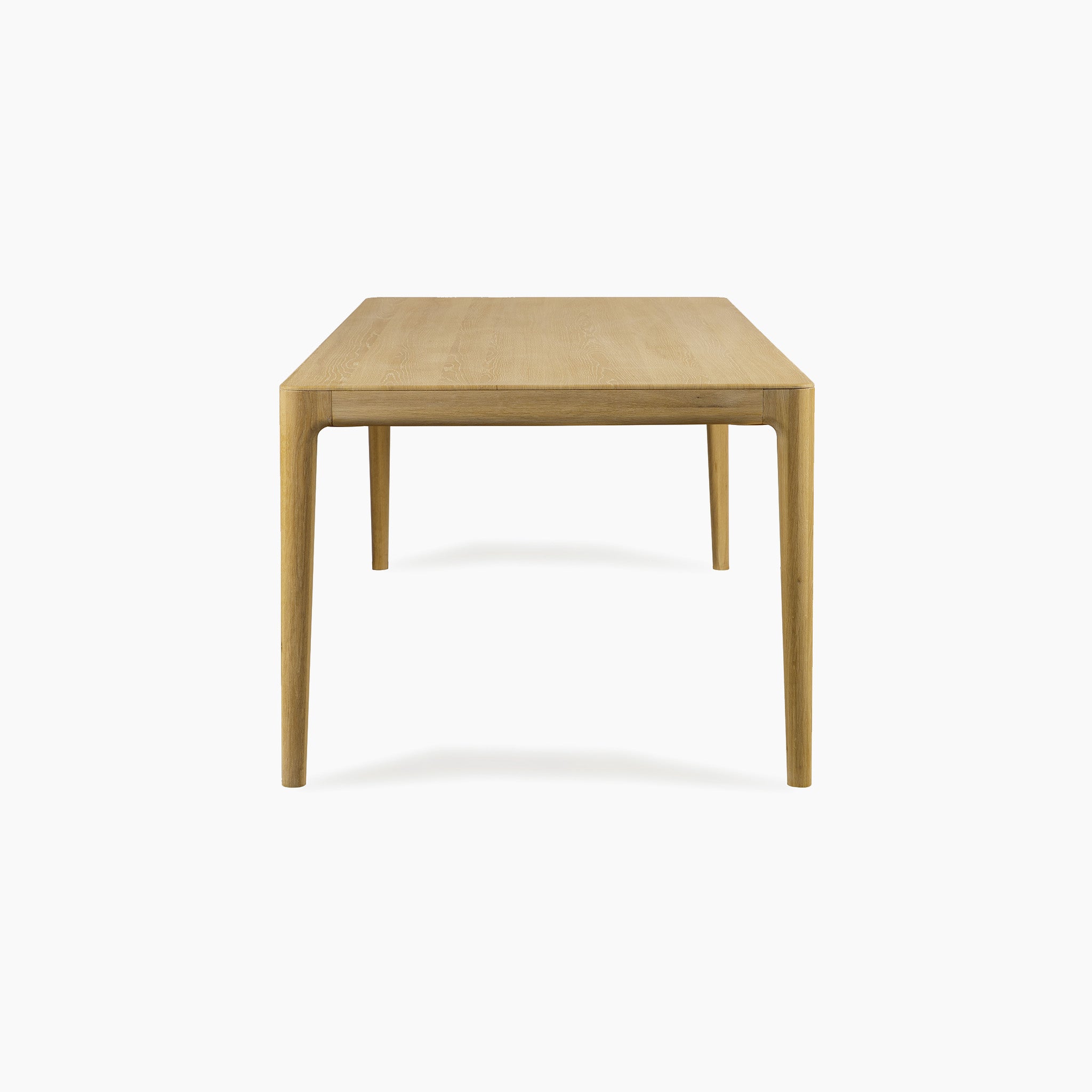 The Marlow 8 Seat Dining Set with Wooden Benches in Light Oak features a rectangular solid table with four straight legs, shown from the end against a white background—ideal for pairing with its matching benches.