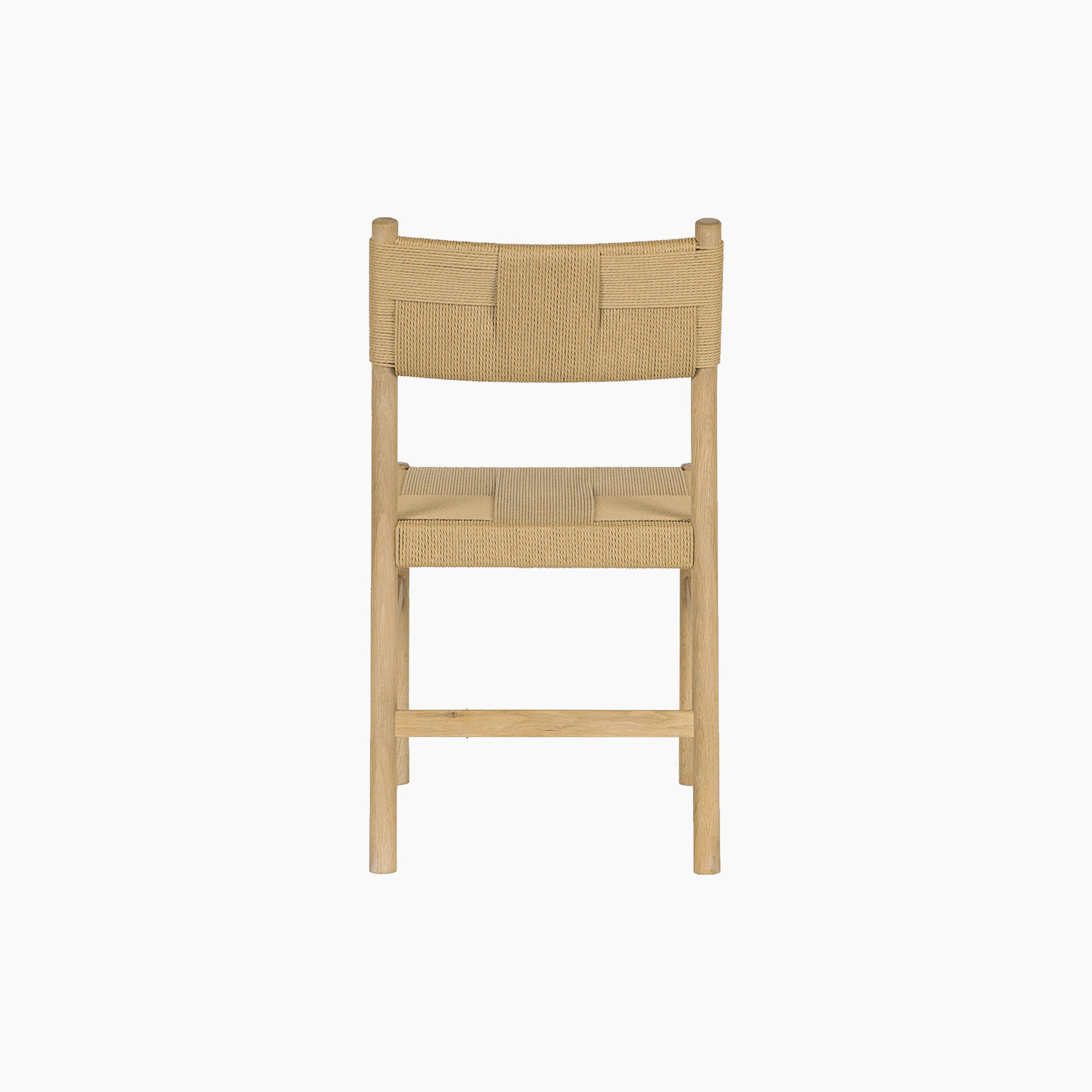 The Amberley 4 Seat Round Extending Dining Set with Marlow Woven Dining Chair in Light Oak features a stylish wooden chair with woven seat and backrest—a perfect farmhouse addition, shown from behind against a white background.
