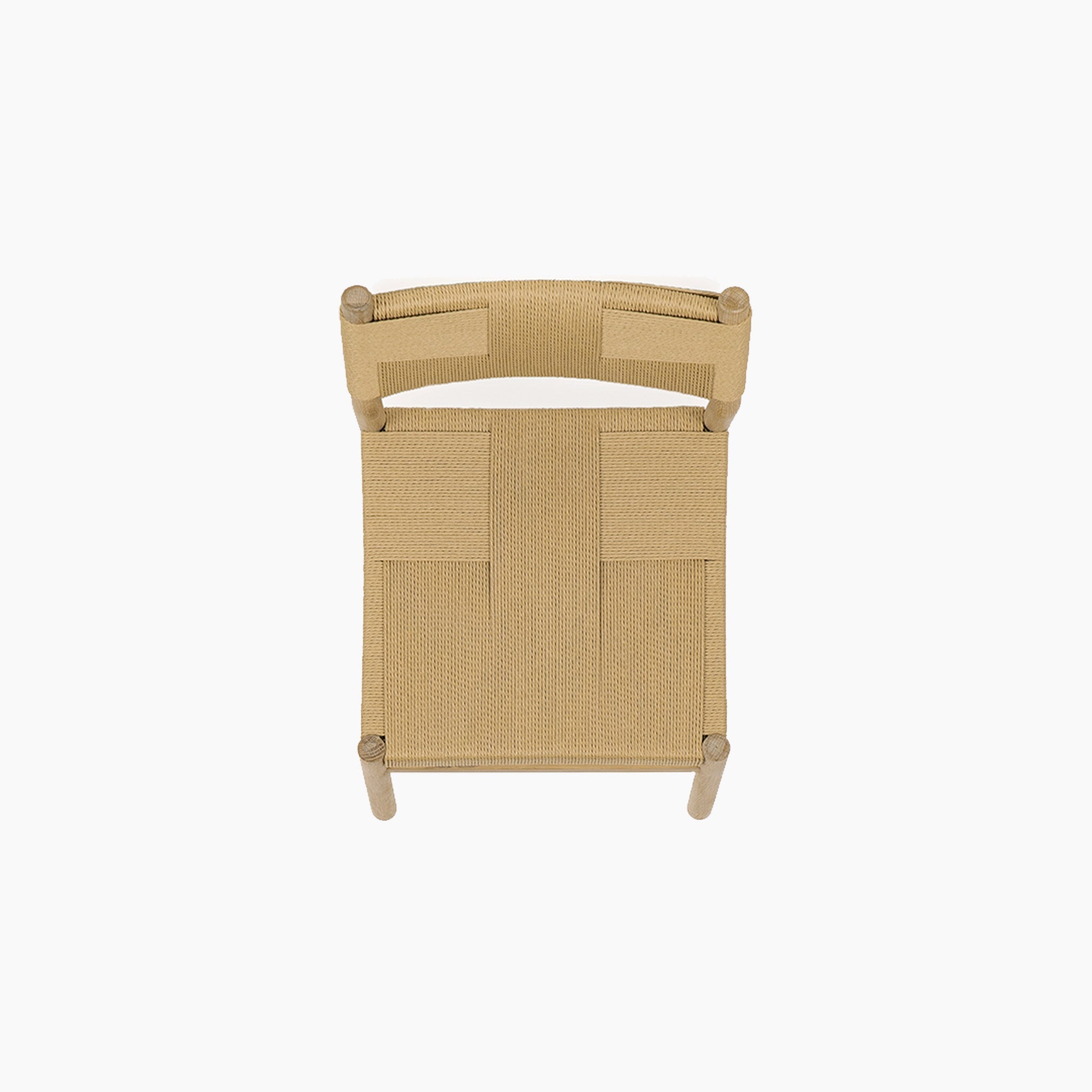 Top view of a Marlow woven dining chair with light tan seat and backrest, styled with the Amberley 4 Seat Round Extending Dining Set in light oak, shown against a white background.