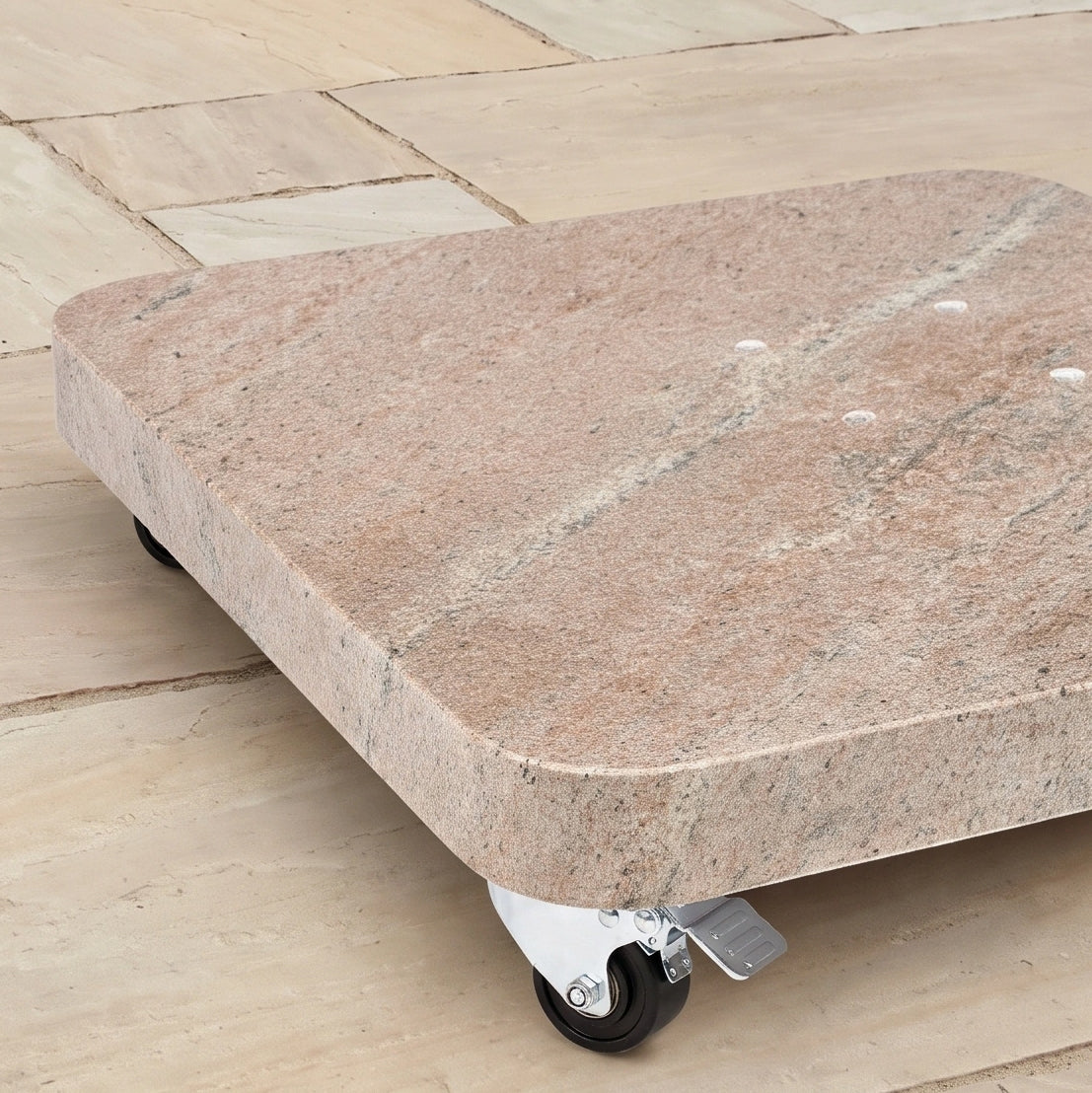 A Nexus T2 Premium 3m Square Cantilever Parasol in Deep Taupe stands supported by the sleek Venezia 90kg Granite Base, a square slab with rounded edges on caster wheels, resting on a tan tiled floor to create a stylish foundation that perfectly complements contemporary garden furniture.