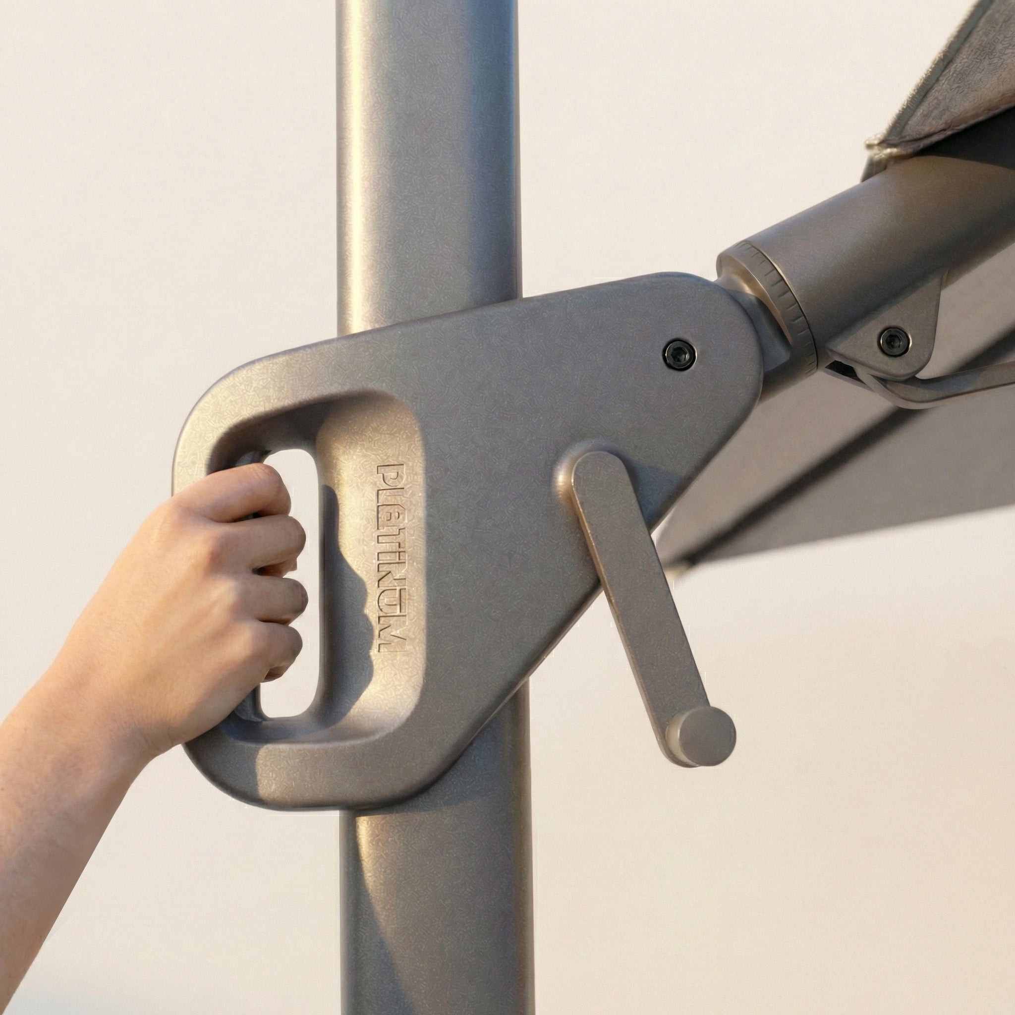 Effortlessly rotate the Nexus T2 Premium 3m Square Cantilever Parasol in Manhattan Grey with its hand-operated crank on a sleek pole, ensuring smooth 360° shade adjustment. Includes a sturdy 90kg granite base for stability.