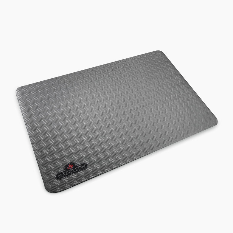 The Napoleon Grill Mat - Small is a rectangular, textured gray mat featuring the SEADESIGN logo on the bottom left corner, placed on a white background—perfect as a fire-resistant mat for your barbecue setup.