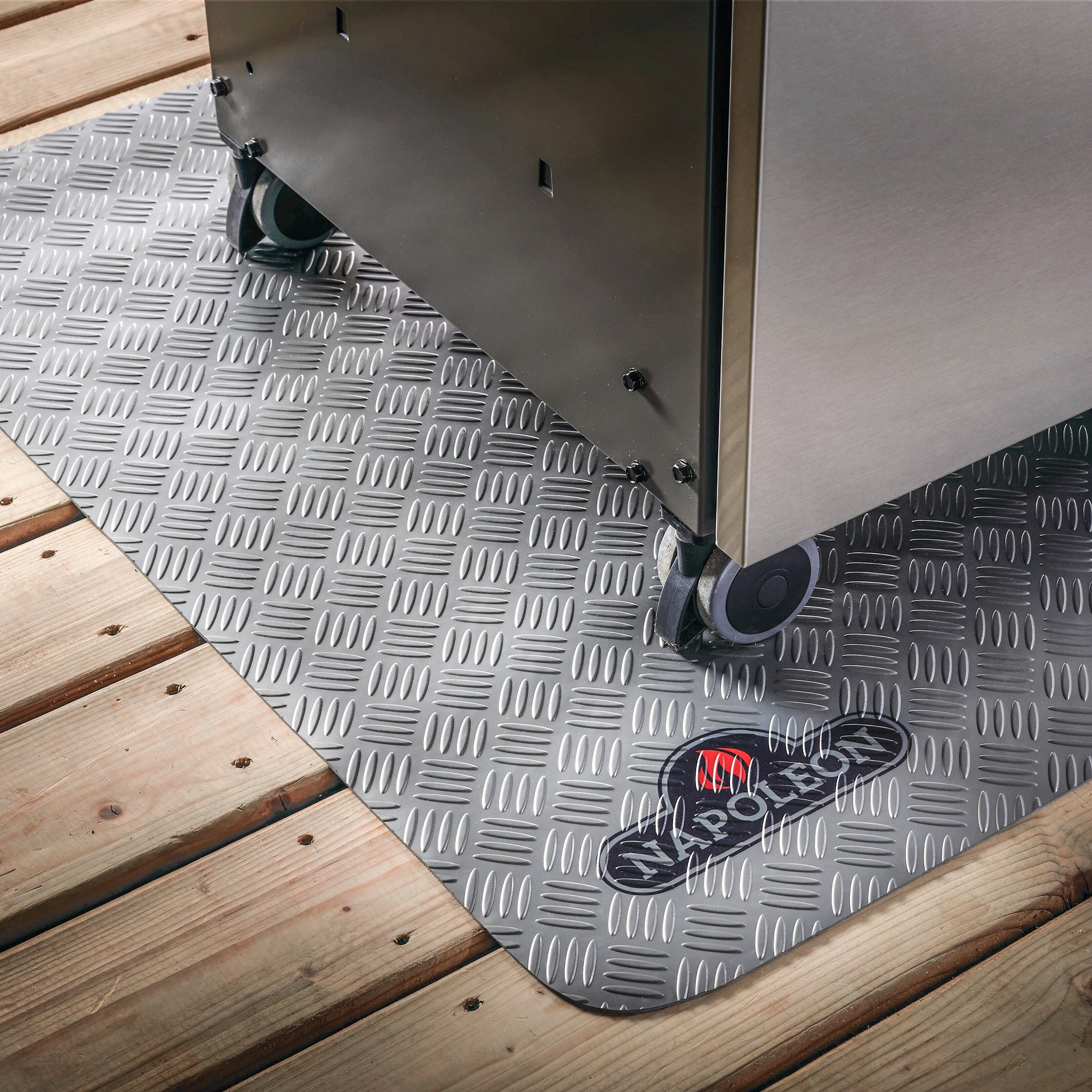 Metal cabinet on wheels on a fire-resistant mat with the "Napoleon Grill Mat - Large" logo, placed on wooden deck.