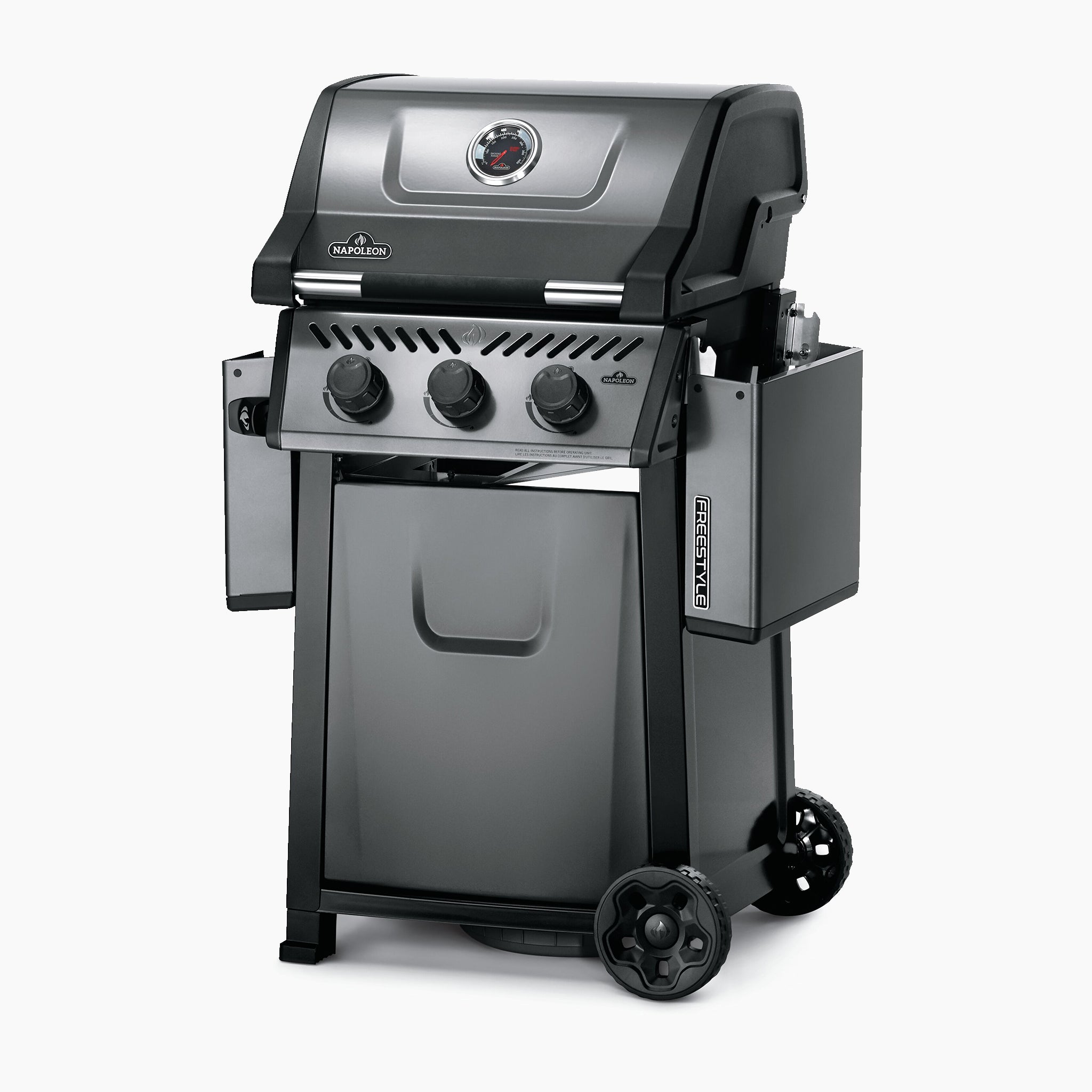 The Napoleon Freestyle 365 Gas Barbecue is a stainless steel propane gas grill featuring a closed lid, three control knobs, side trays, cast iron cooking grids, and wheels for easy mobility.