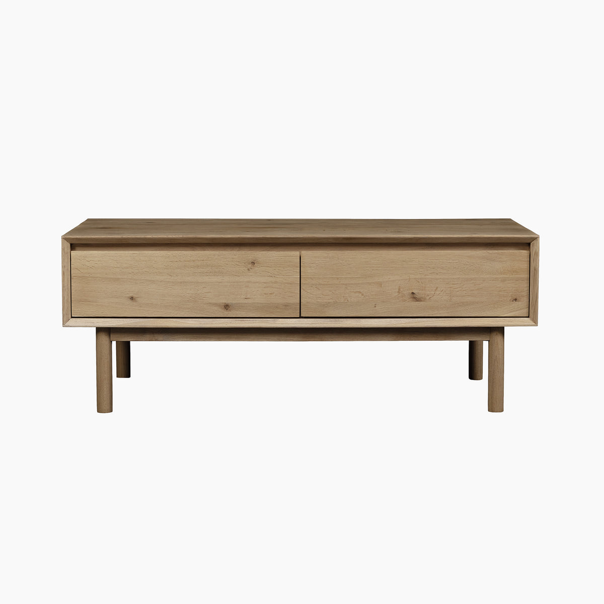 The Oslo Coffee Table with 4 Drawers in Light Oak features a simple modern design inspired by Scandinavian style, with four straight legs and ample storage. This solid oak coffee table brings Oslo charm to your living space.